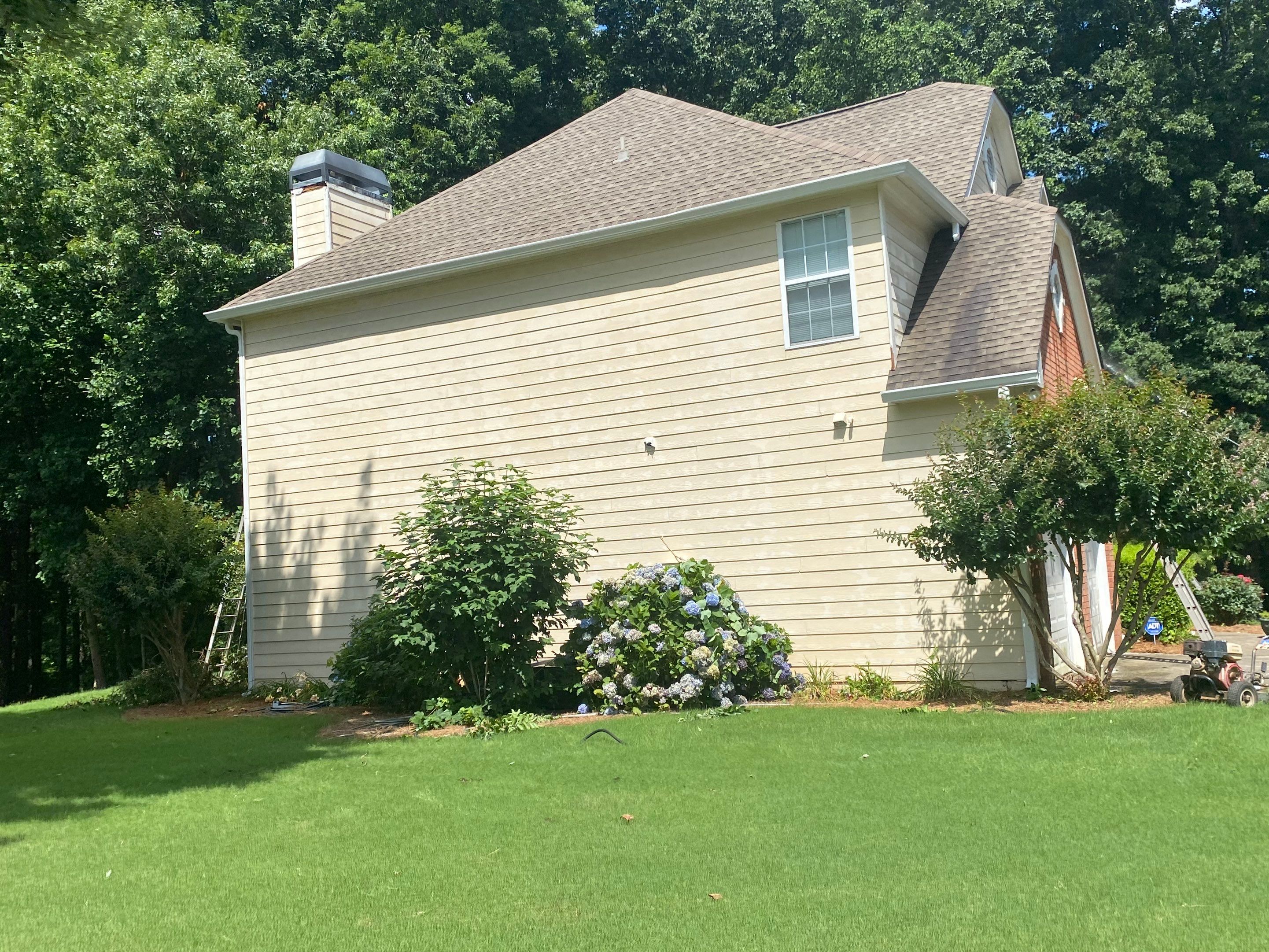 Full Exterior Siding and Trim Painting for Acworth Two-Story Home by Swift Home Renovations 