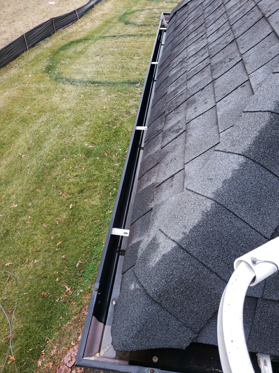 Gutter Cleaning using water by Power Wash Masters LLC