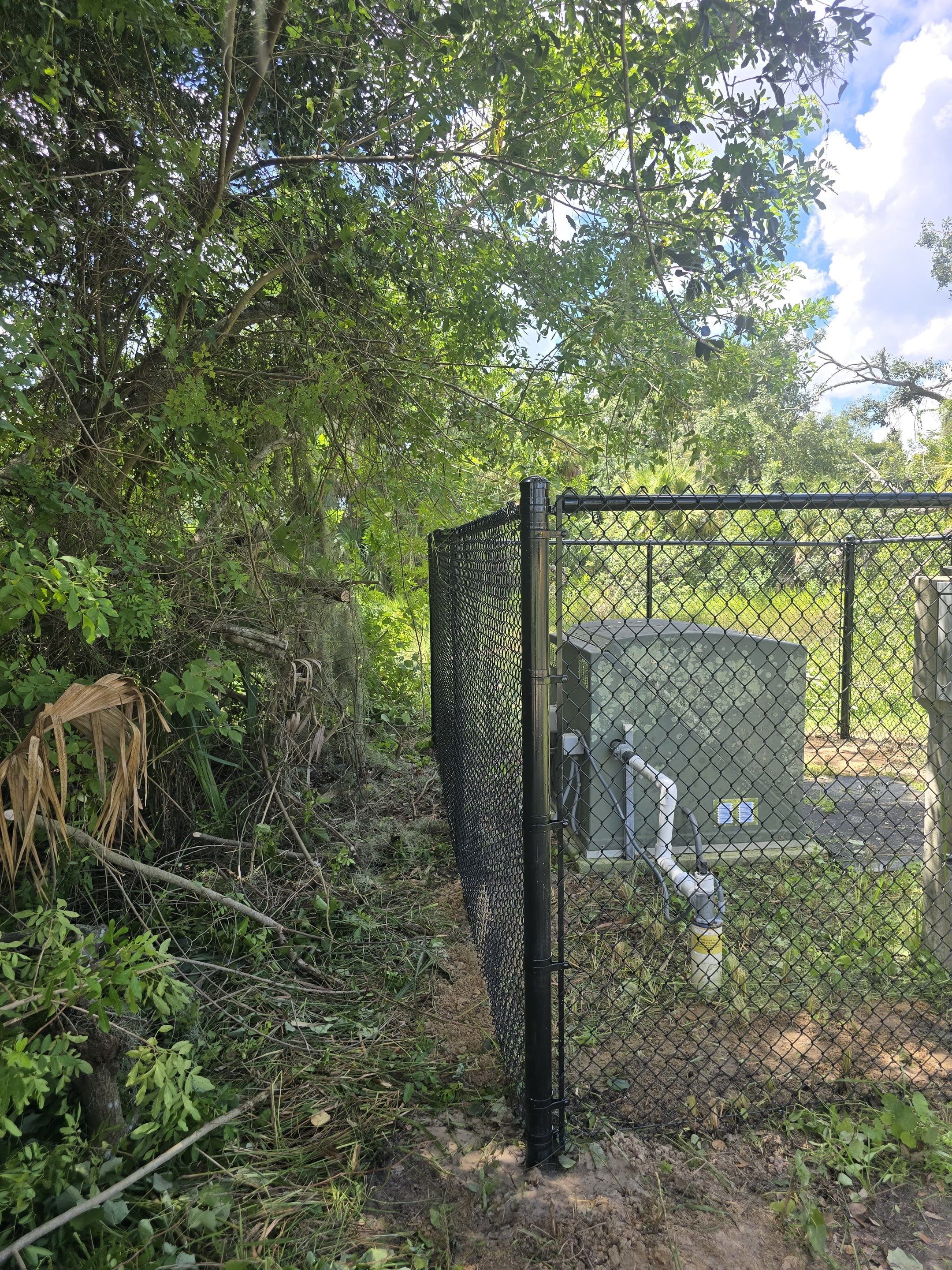 Commercial Black Chain Link Fence Installation in North Port by True Fence LLC