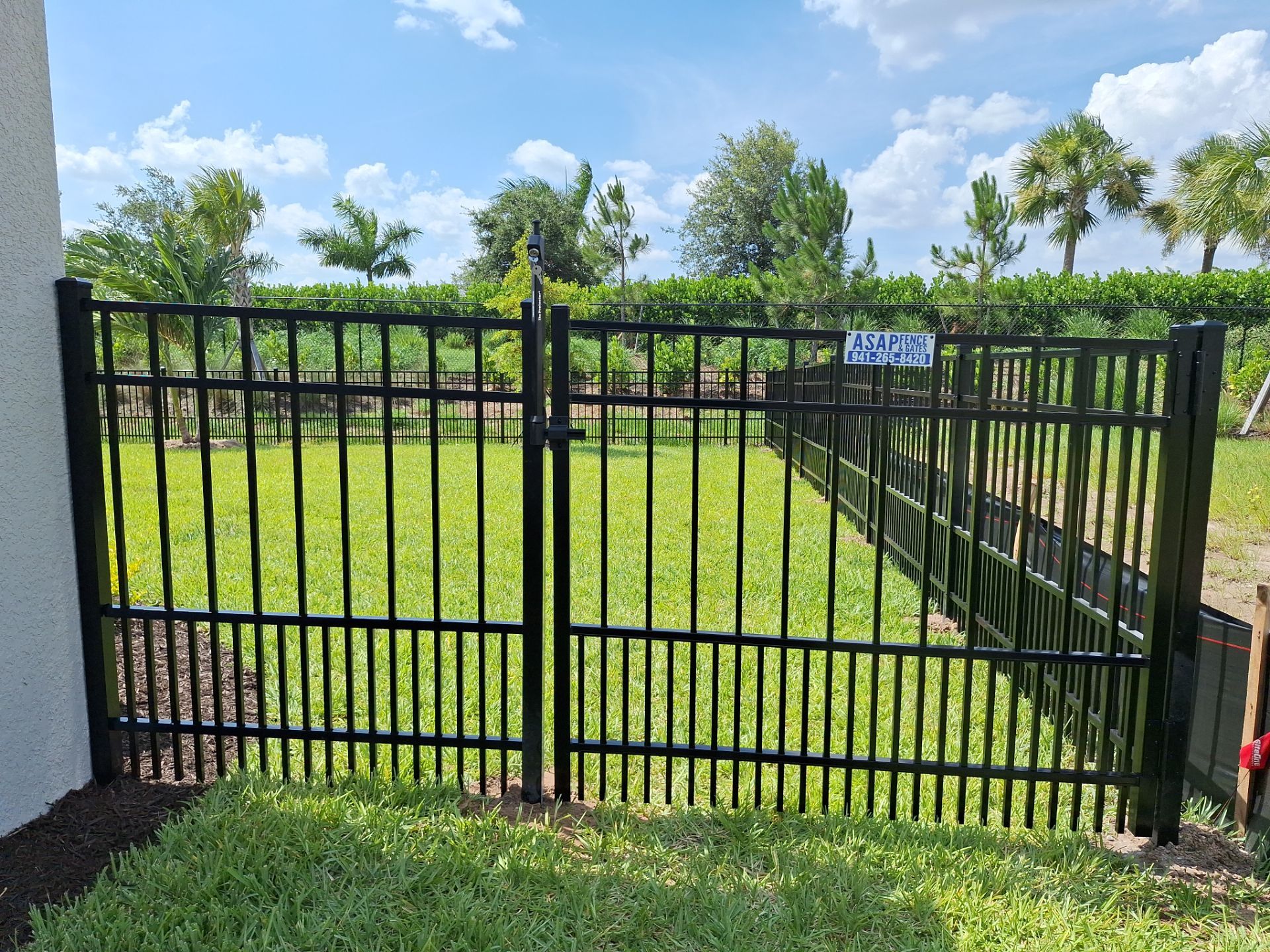 Aluminum Fence Installation using Black 3 Rail Aluminum Fence by Asap fence and gates, LLC