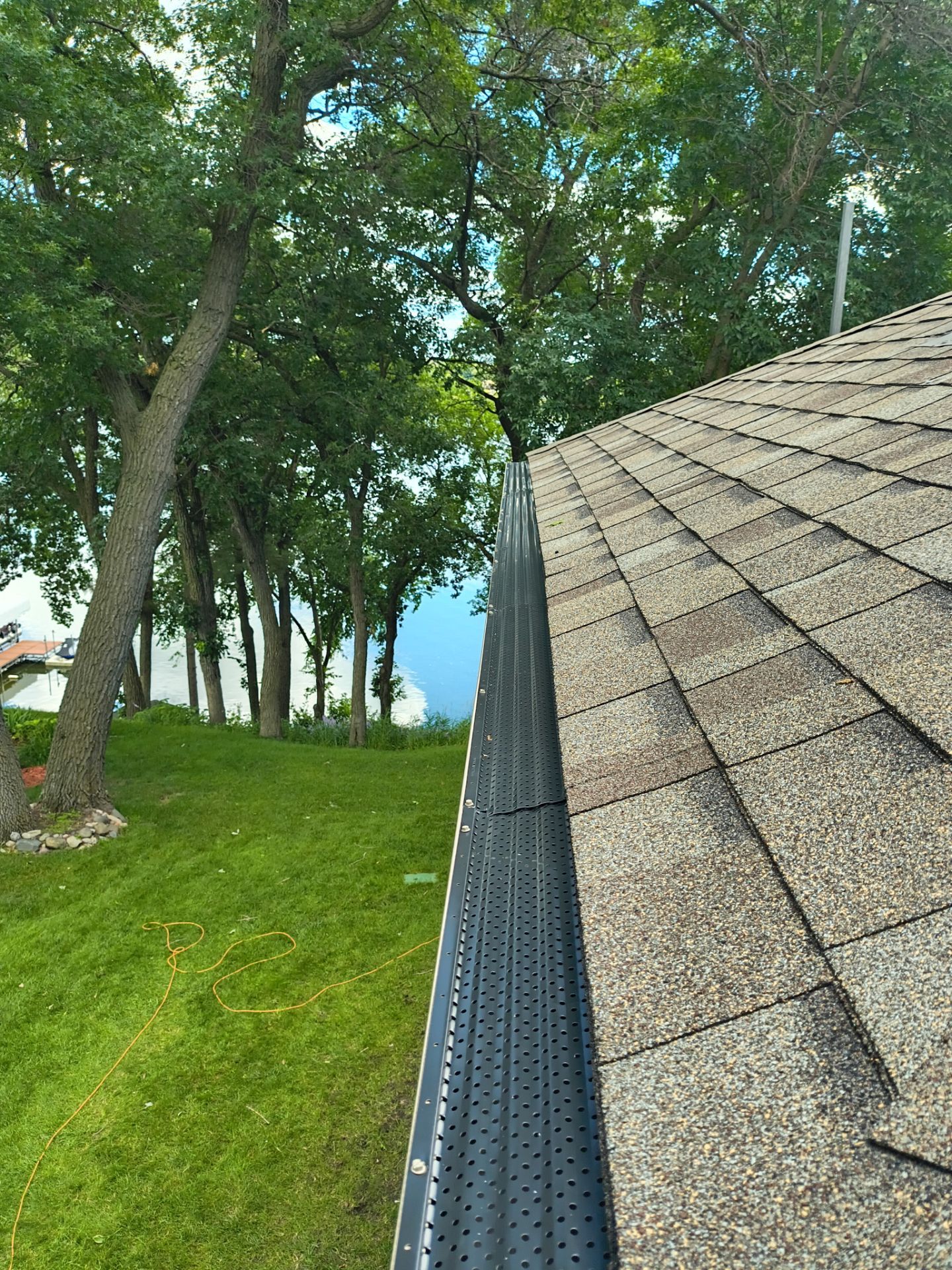 5" Seamless Gutter Installation with Leaf Exterminator Gutter Covers – Clear Lake, MN by Next Level Seamless Gutters / Exteriors Inc.