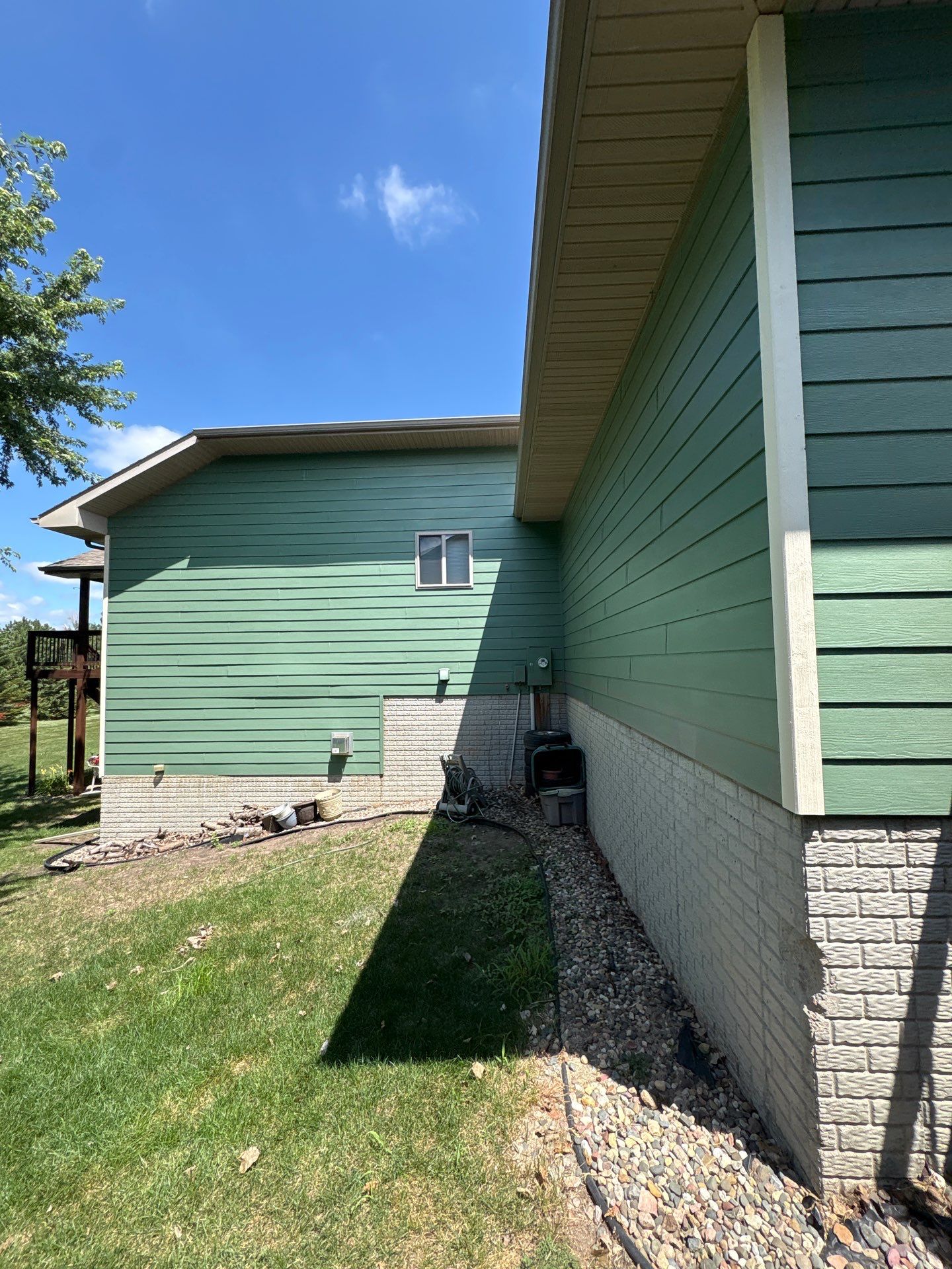 Full Exterior Residential Painting and Siding Refresh in Tea by Select Painting, Coatings & Garage Cabinets