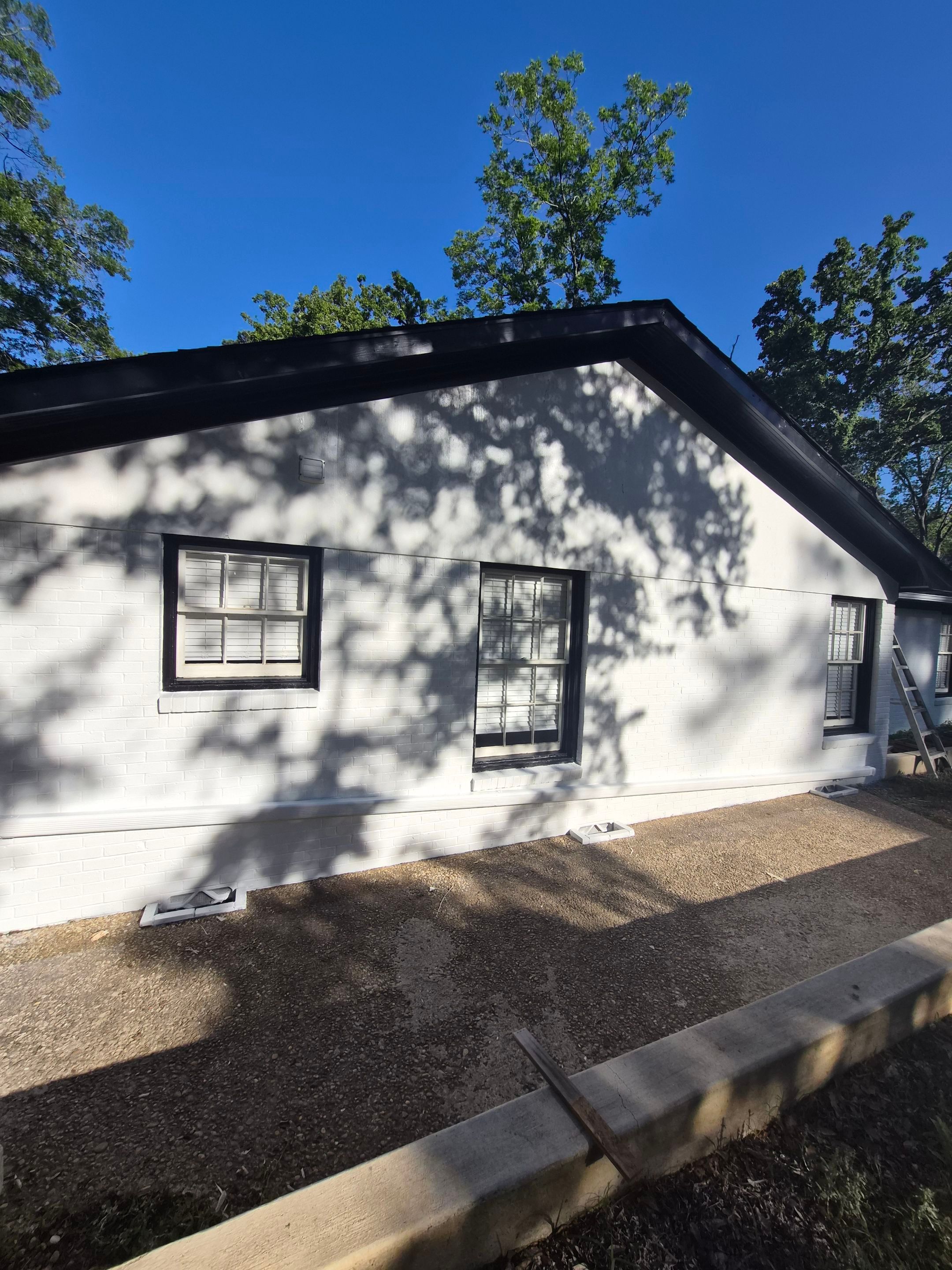 From Gray to Modern White: Exterior Repaint in Tyler, TX by Quality Coats Painting