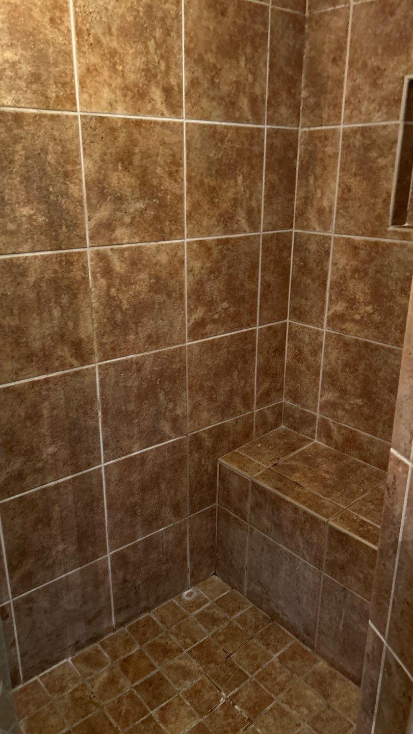 Tile shower and floor by Footprints Floors of Nashville