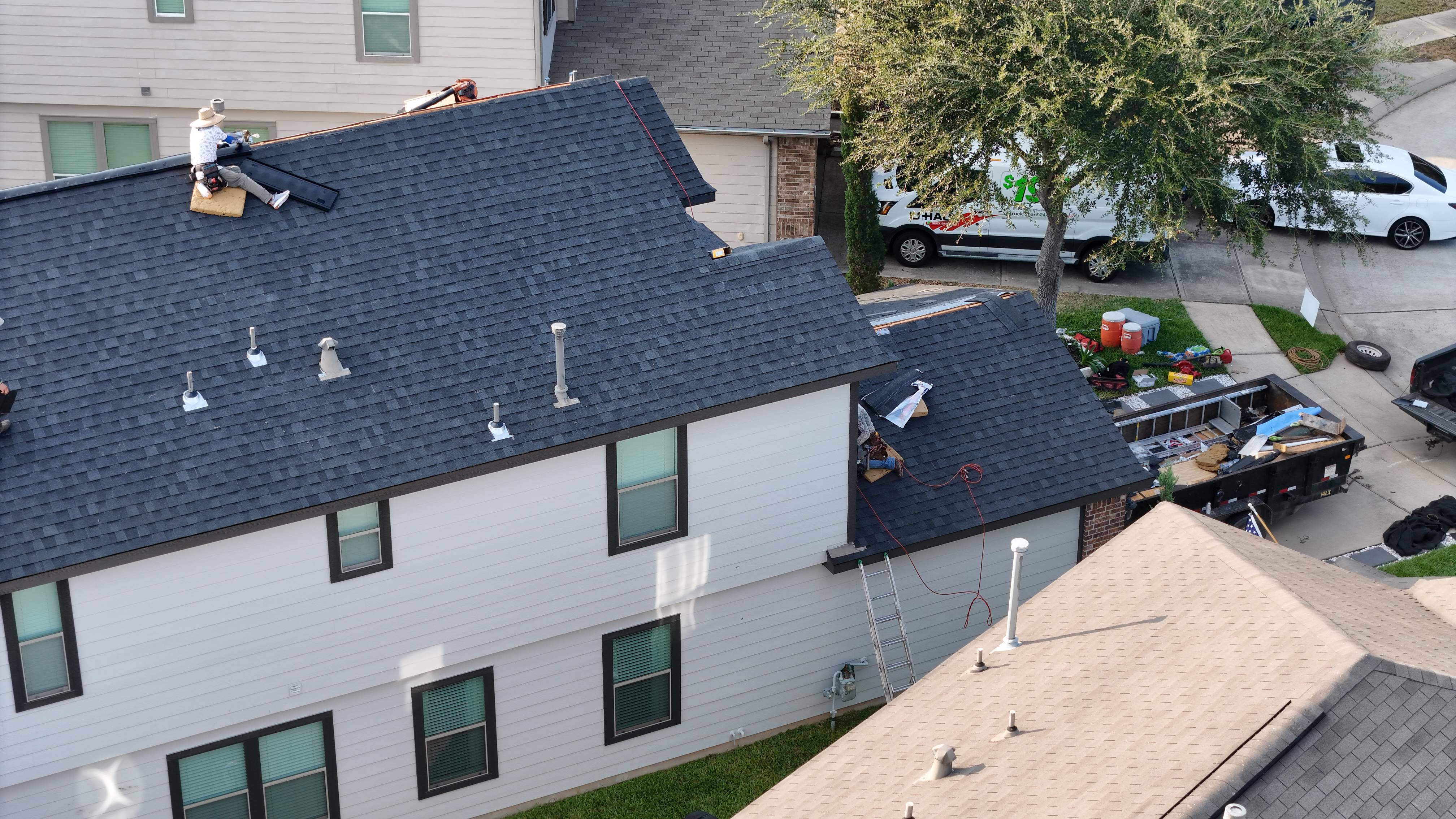 Charcoal Roof on Modern Farmhouse — Cypress, TX by PL Roofing & SB Roofing, LLC.