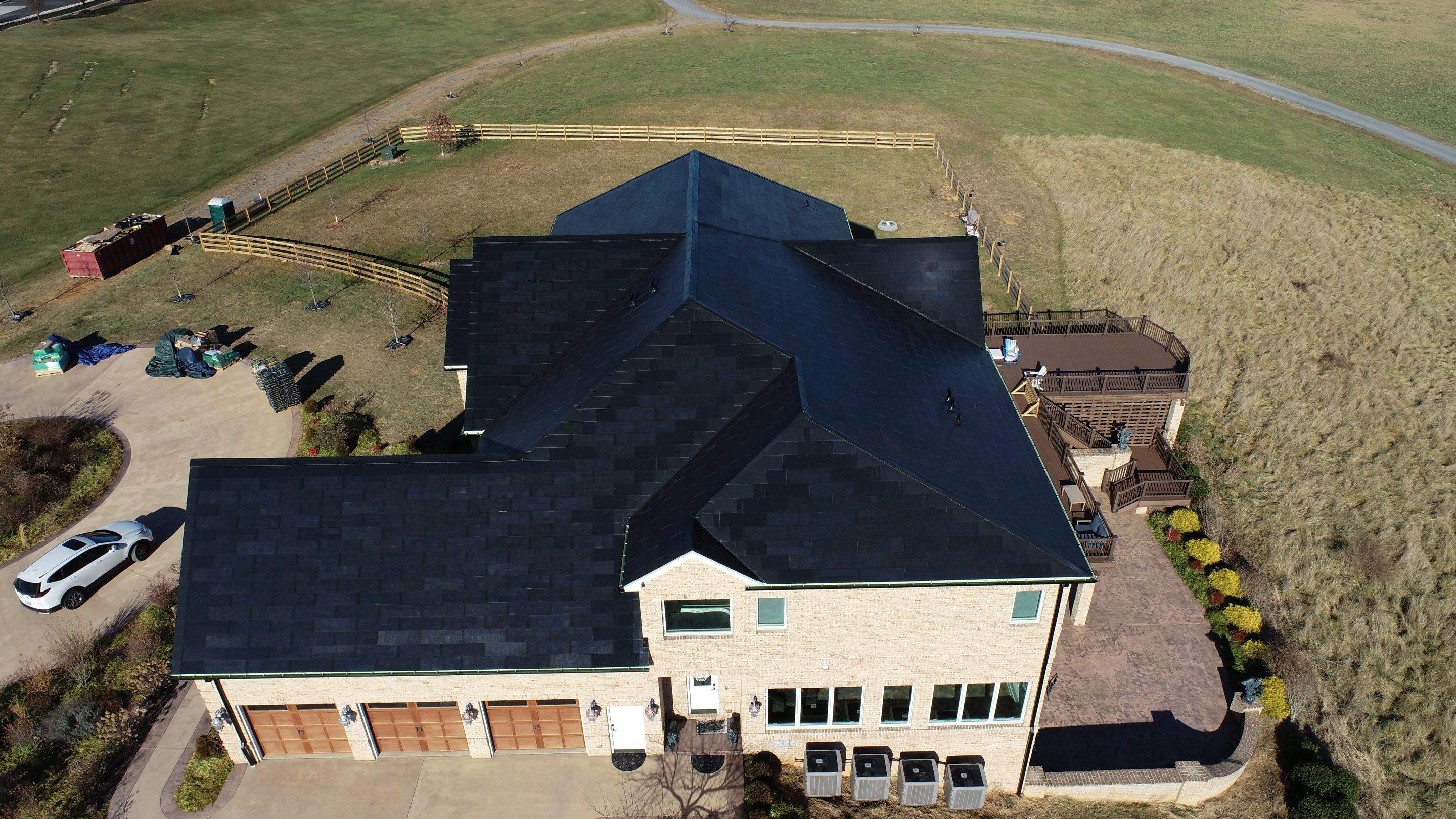 Tesla Solar Roof Replacement  by American Home Contractors