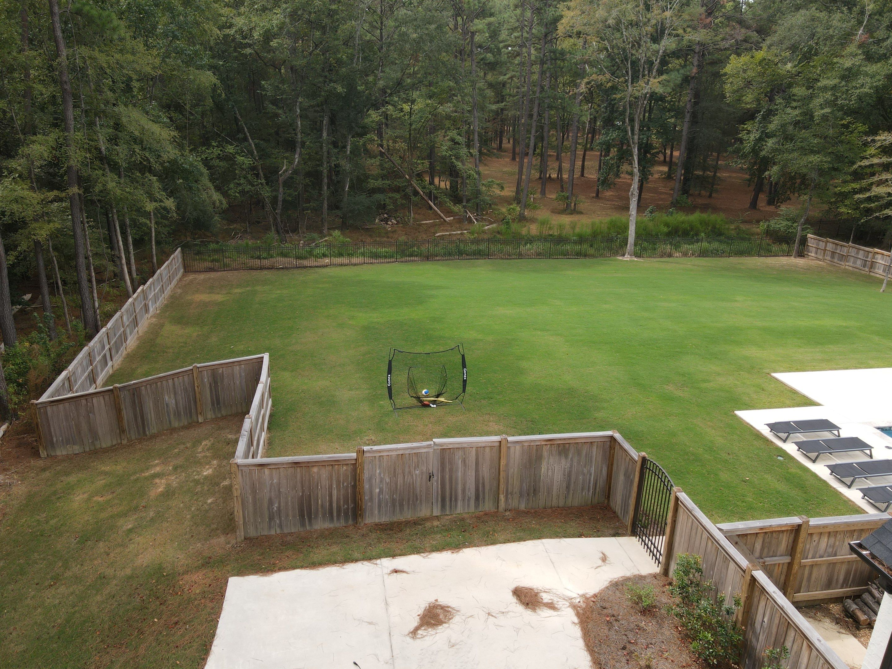 Fence Stain using Wood Defender Black  by Roberson Construction LLC