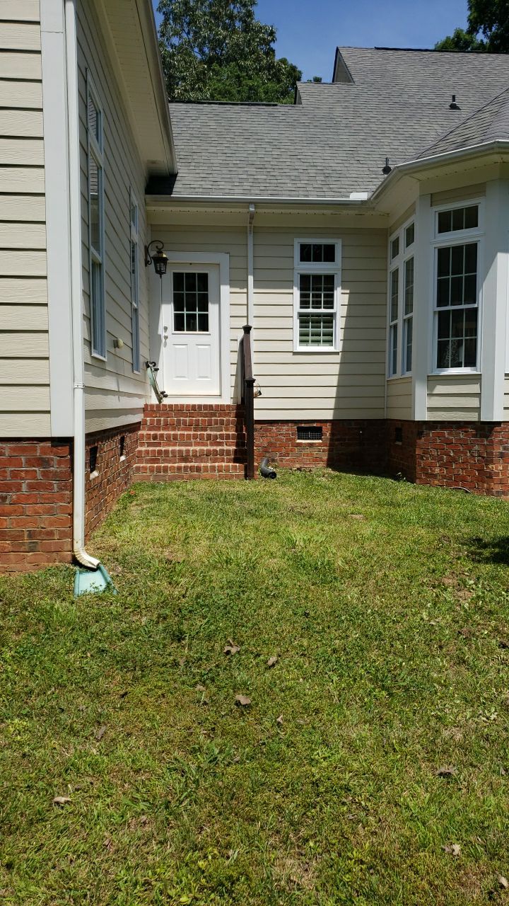 House Wash using cleaner by Power Wash Masters LLC