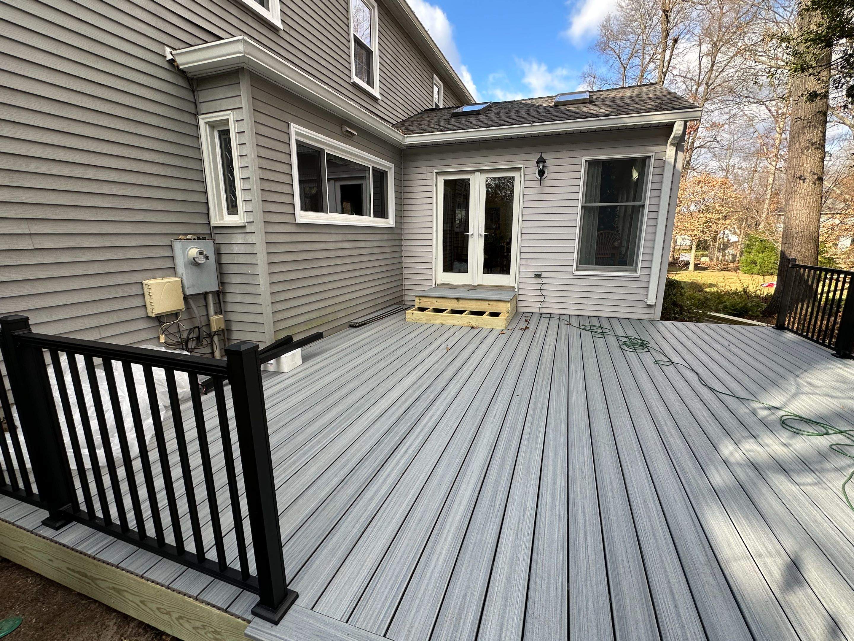 Trex Deck Resurfacing & New Railing in Sterling, VA by Sunburst Construction Inc
