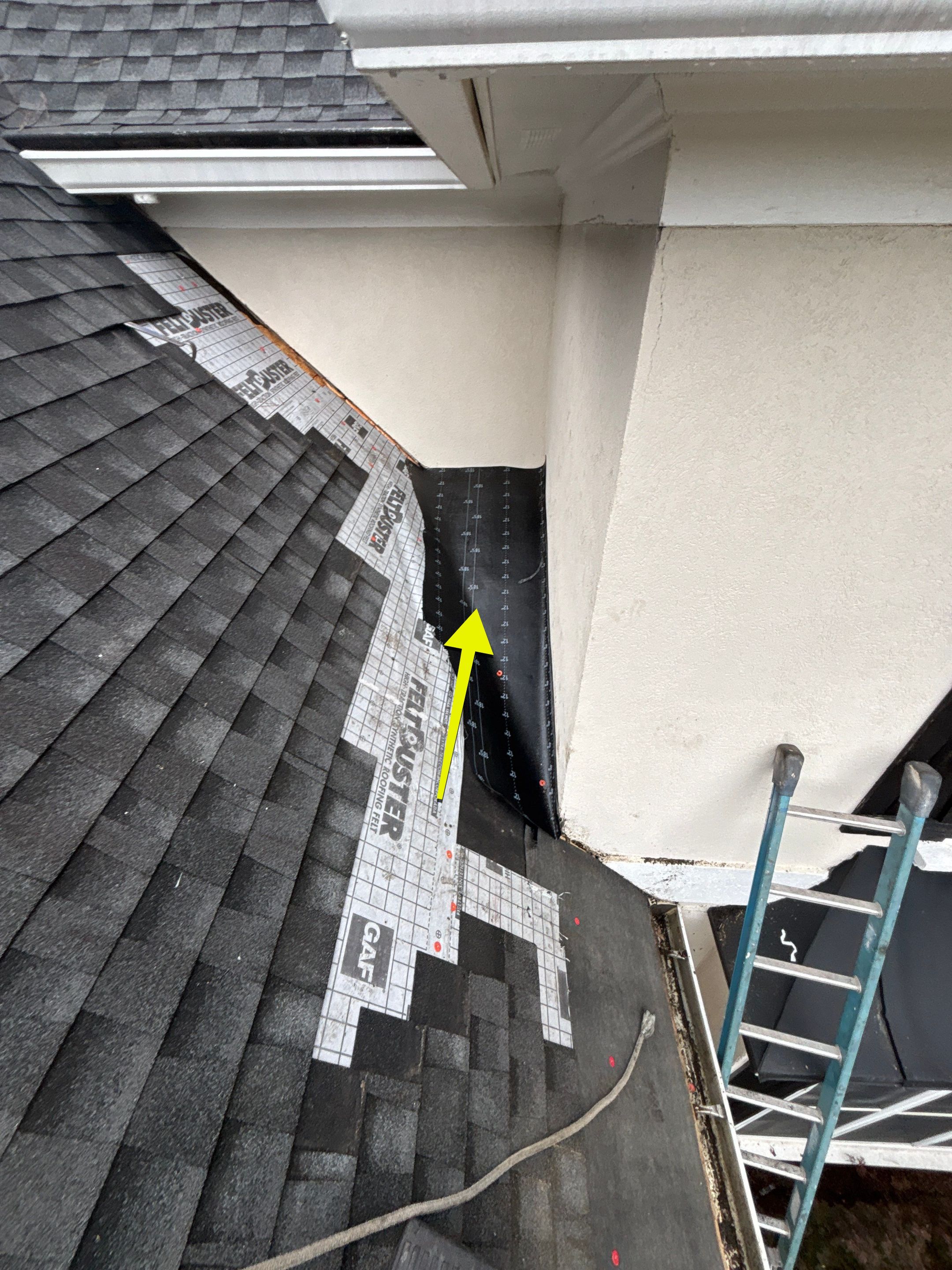 Wrong V valley section installed  by Deerfield Roofing LLC