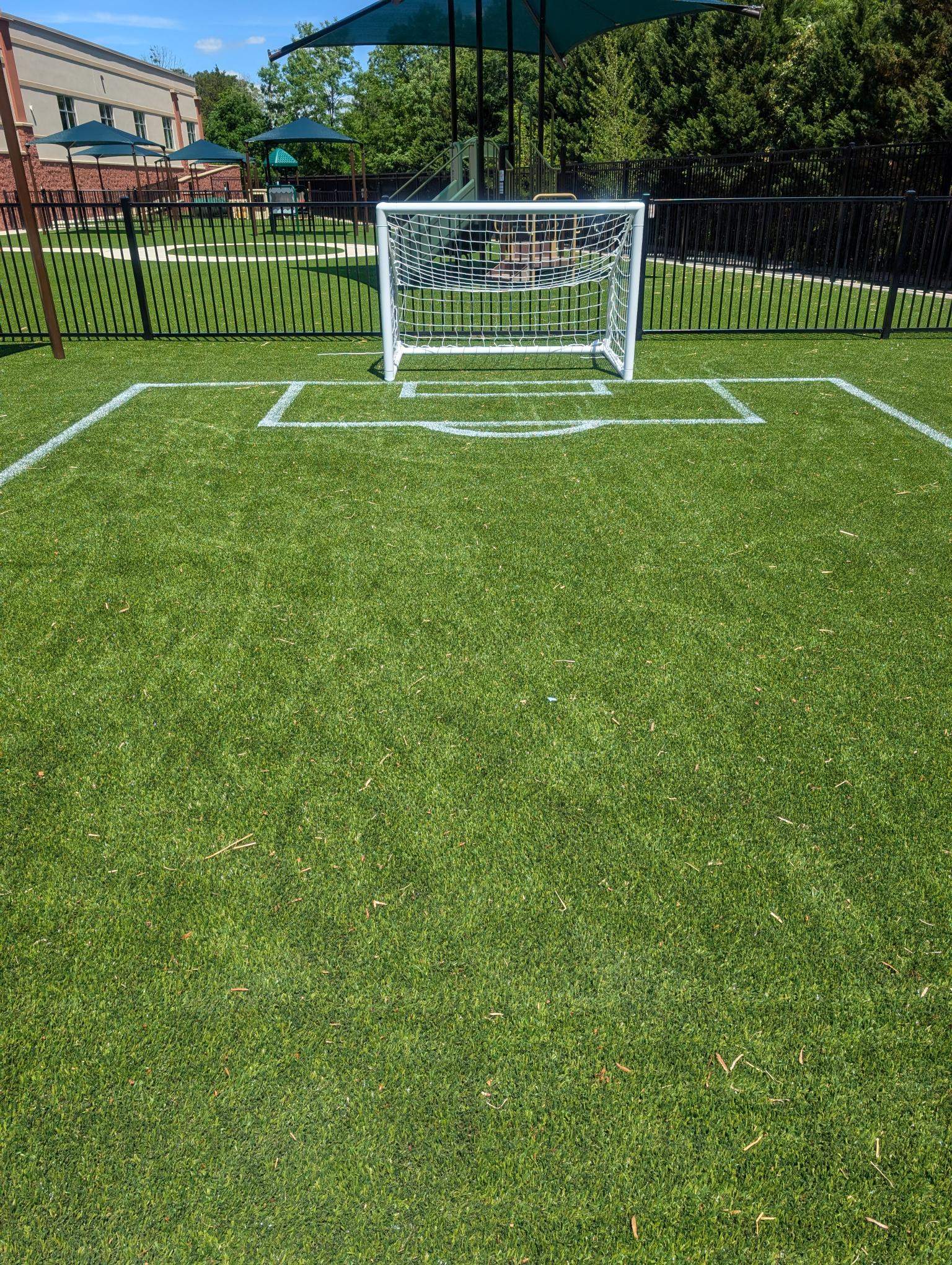 KinderCare Playground Turf and Custom Athletic Striping in Fredericksburg by Southwest Greens Midwest