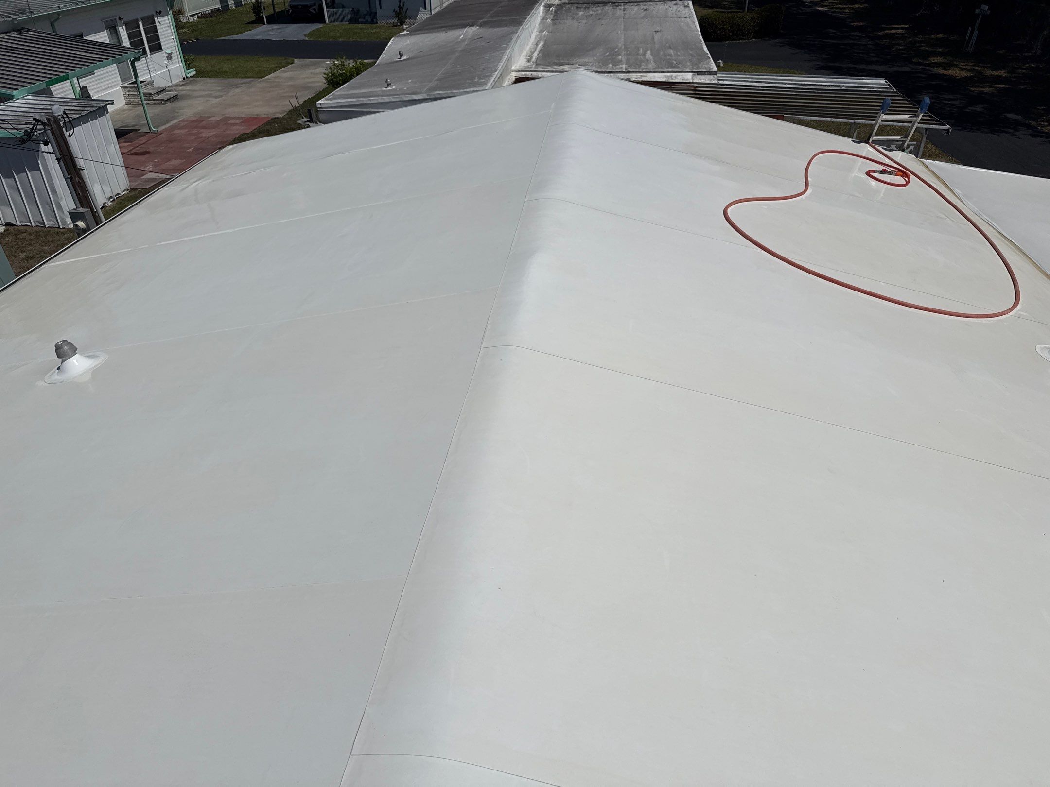 Mobile Home Soft Wash & TPO Roof Cleaning in Plaza Estates – Bradenton, FL by Sunshine AquaWash