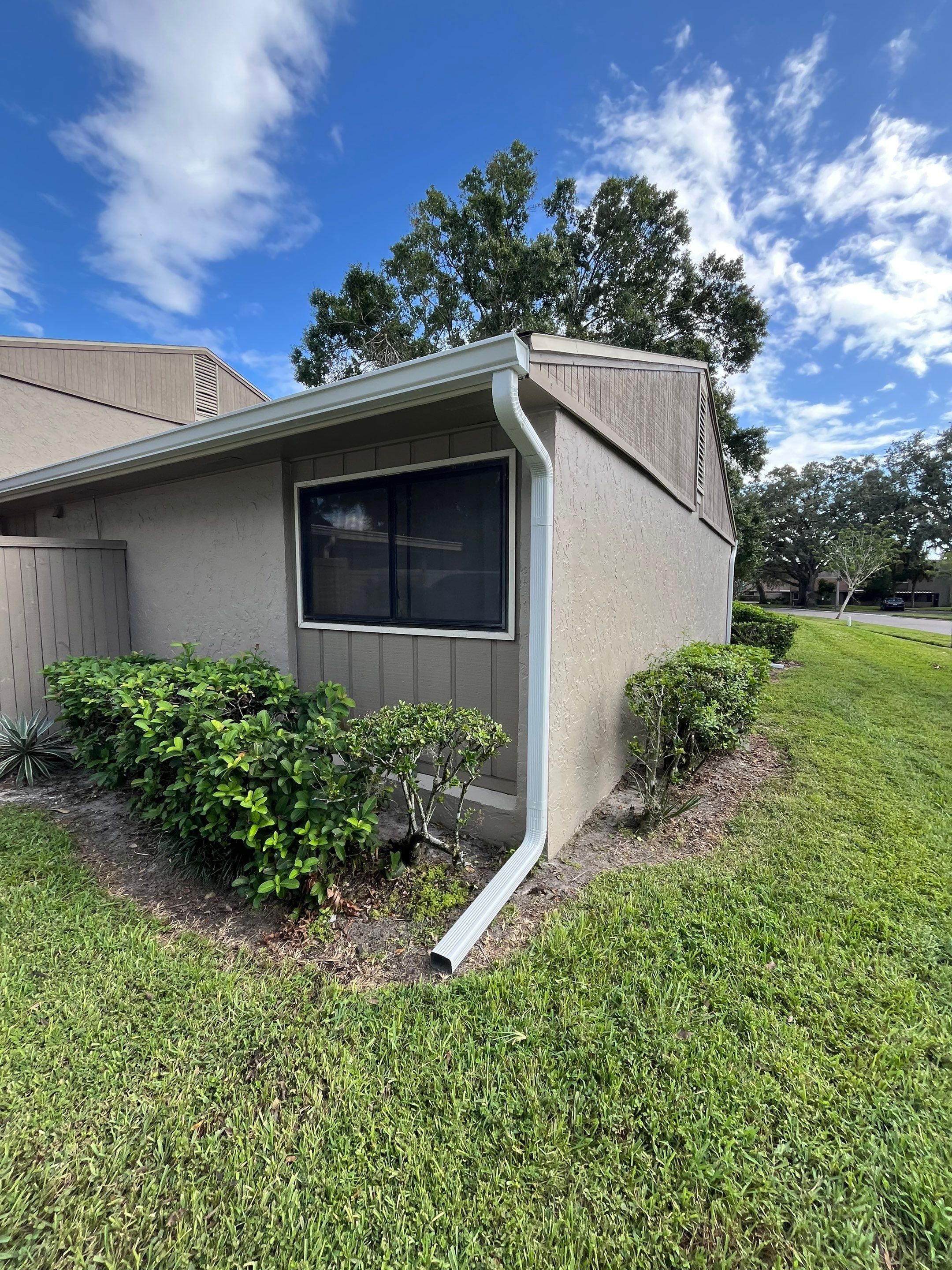 Professional Downspout Installation in Tampa, FL by Gutter Professor by Gutter Professors