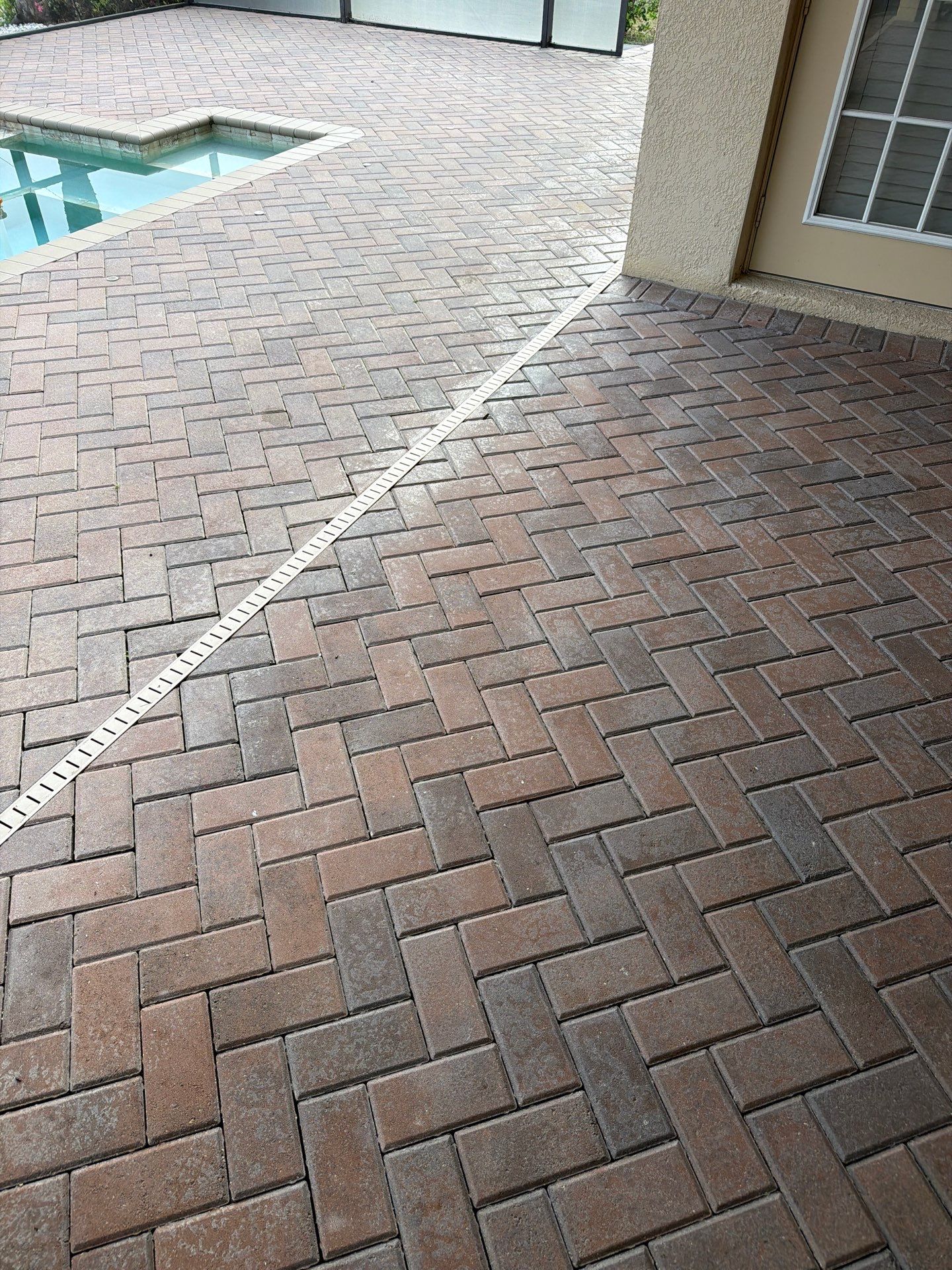 Paver Pool Deck Stripping and Sealing Project in Sun City Center by Supreme Paver Experts