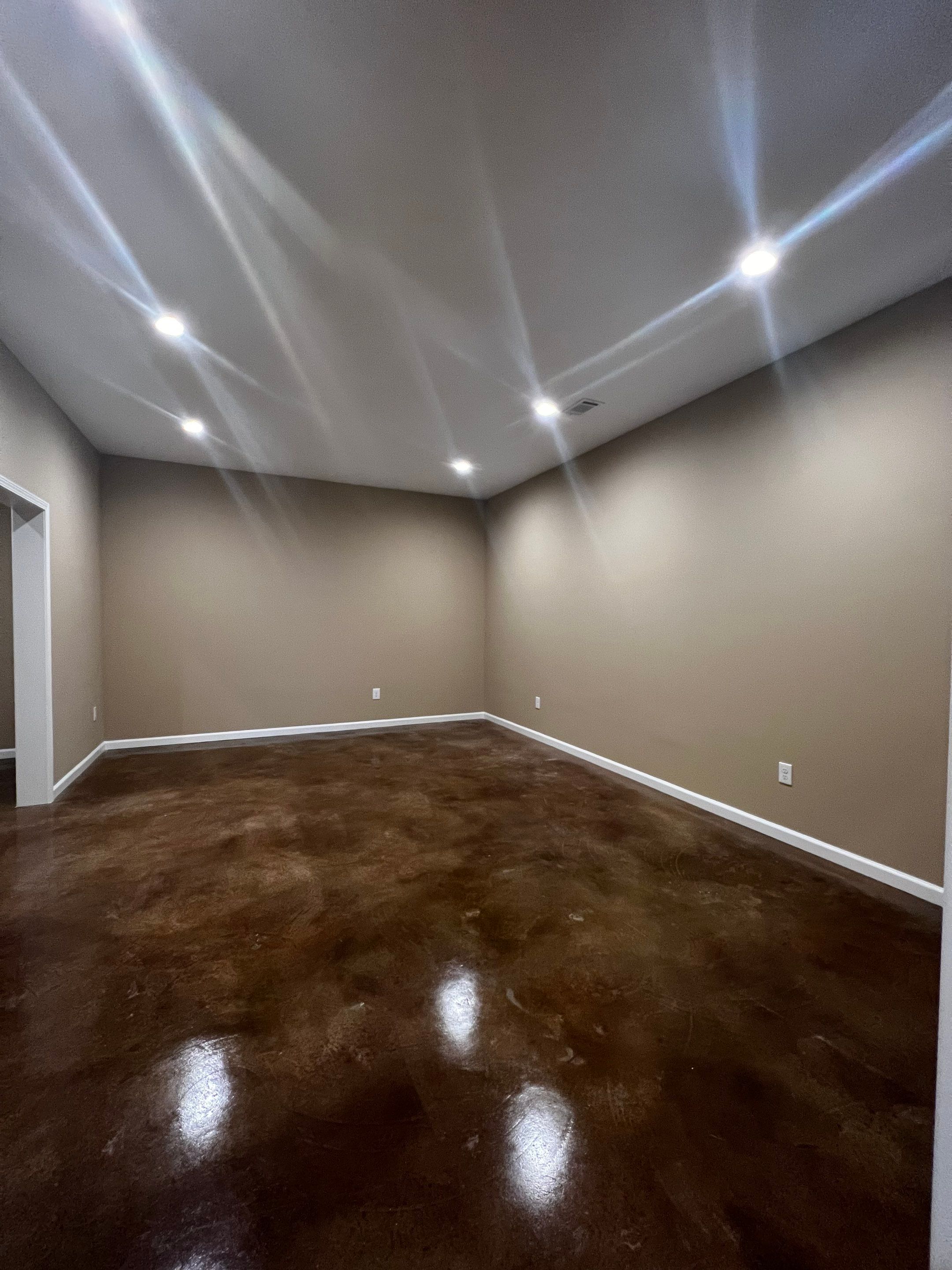 Finished Basement Renovation Featuring Polished Concrete in Atlanta by Swift Home Renovations