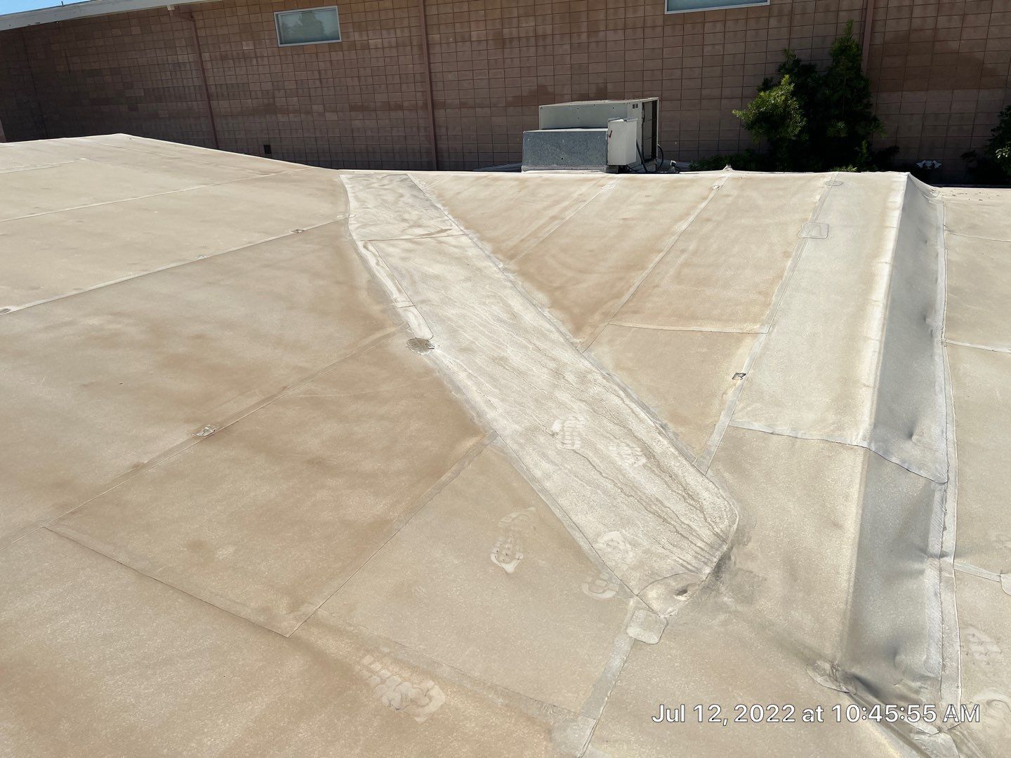 MR Roofing system using Benchmark/PUMA XL coatings over TPO single-ply roofing by Straight Edge Roofing Inc