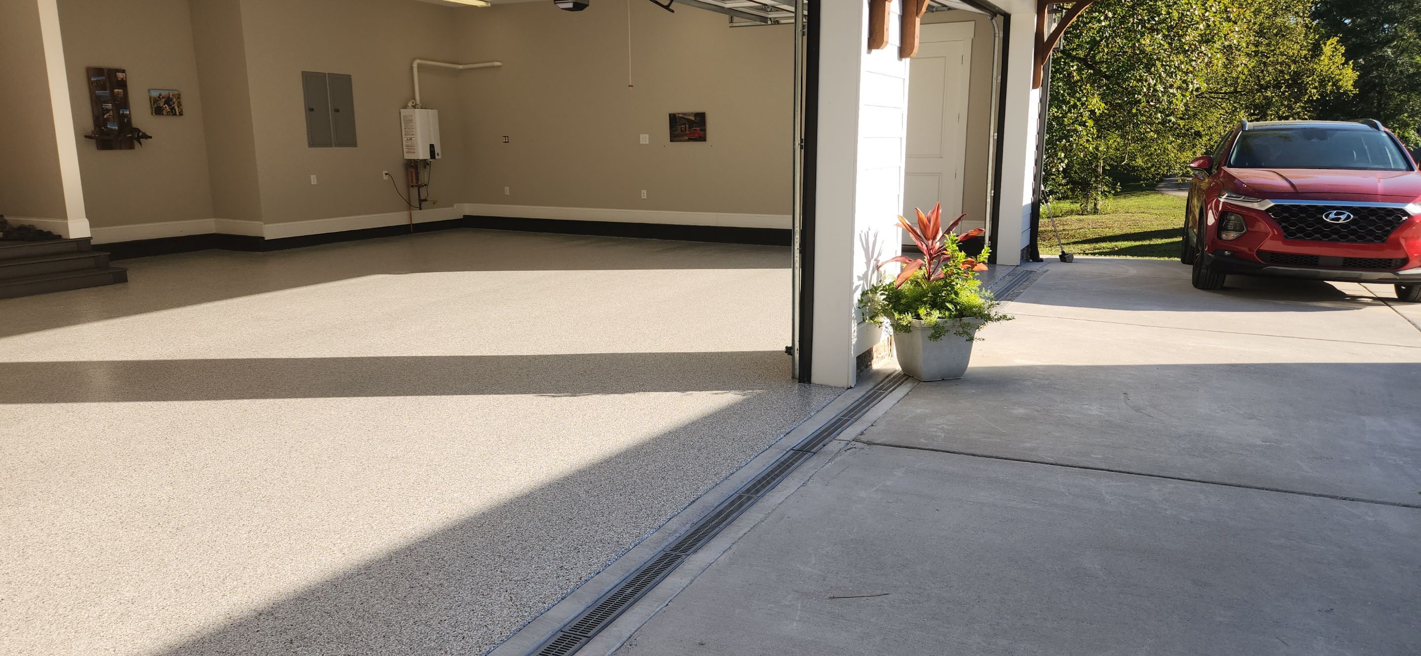 Front Porch and Garage using Coyote & Pumice by Elite Floor Solutions