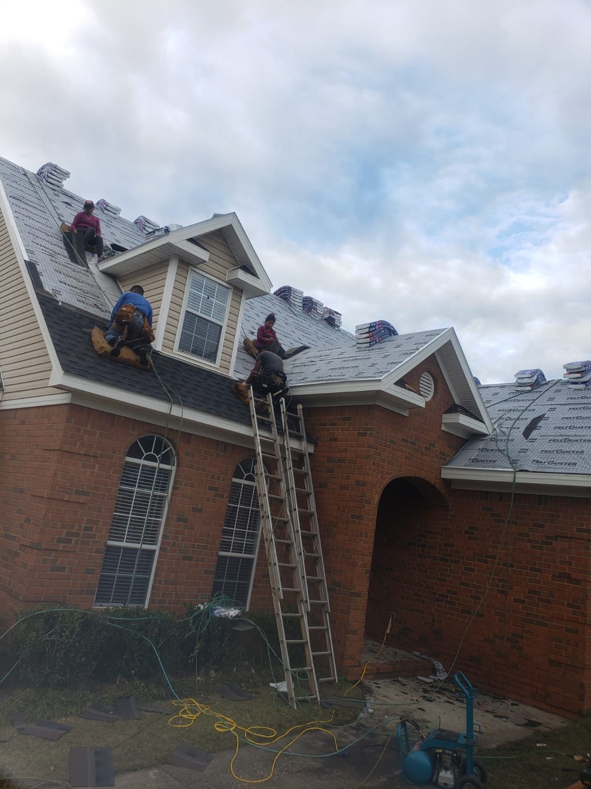 Residential Roofing Installation using Roof Replacement by American Roofing & Construction LLC