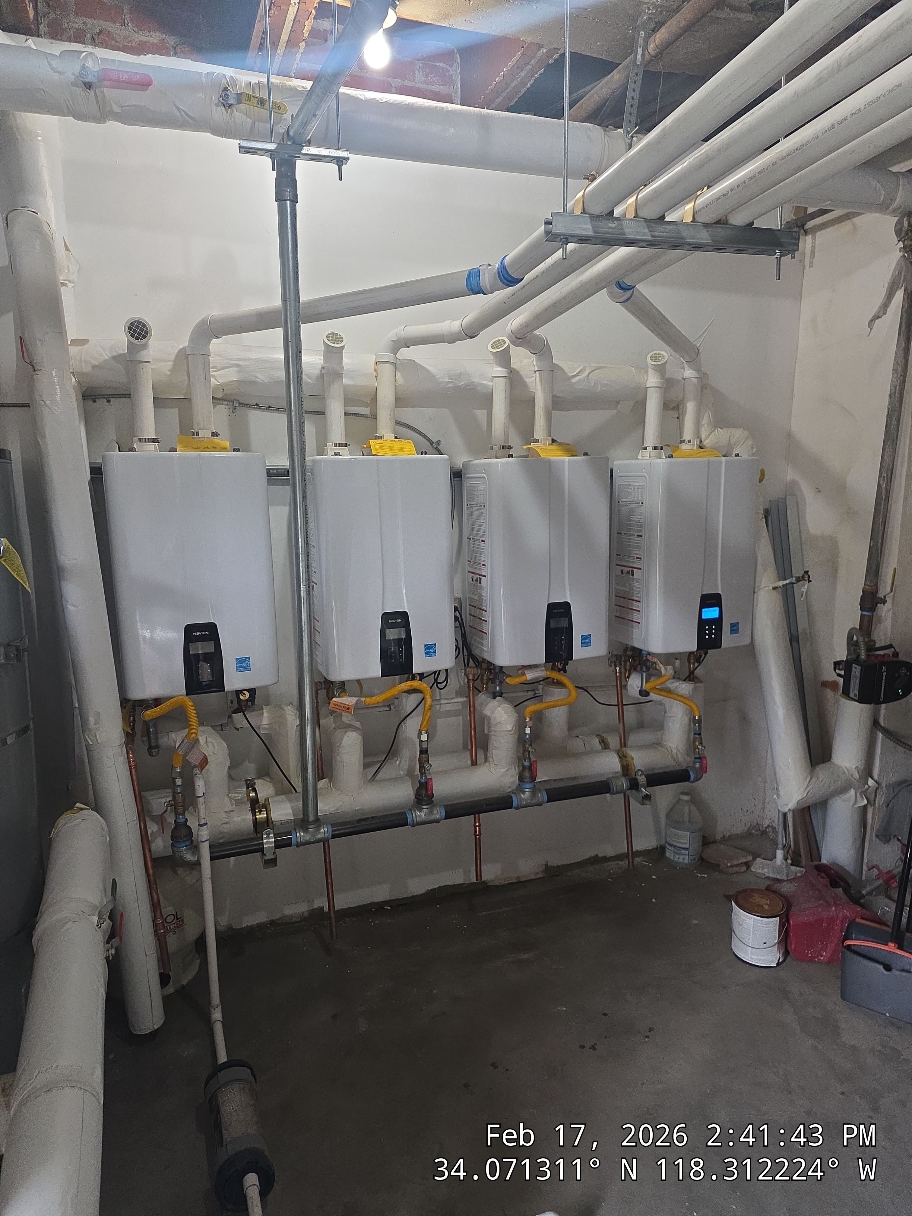 Central Tankless Domestic Hot Water System and Boiler Installation by Current Energy