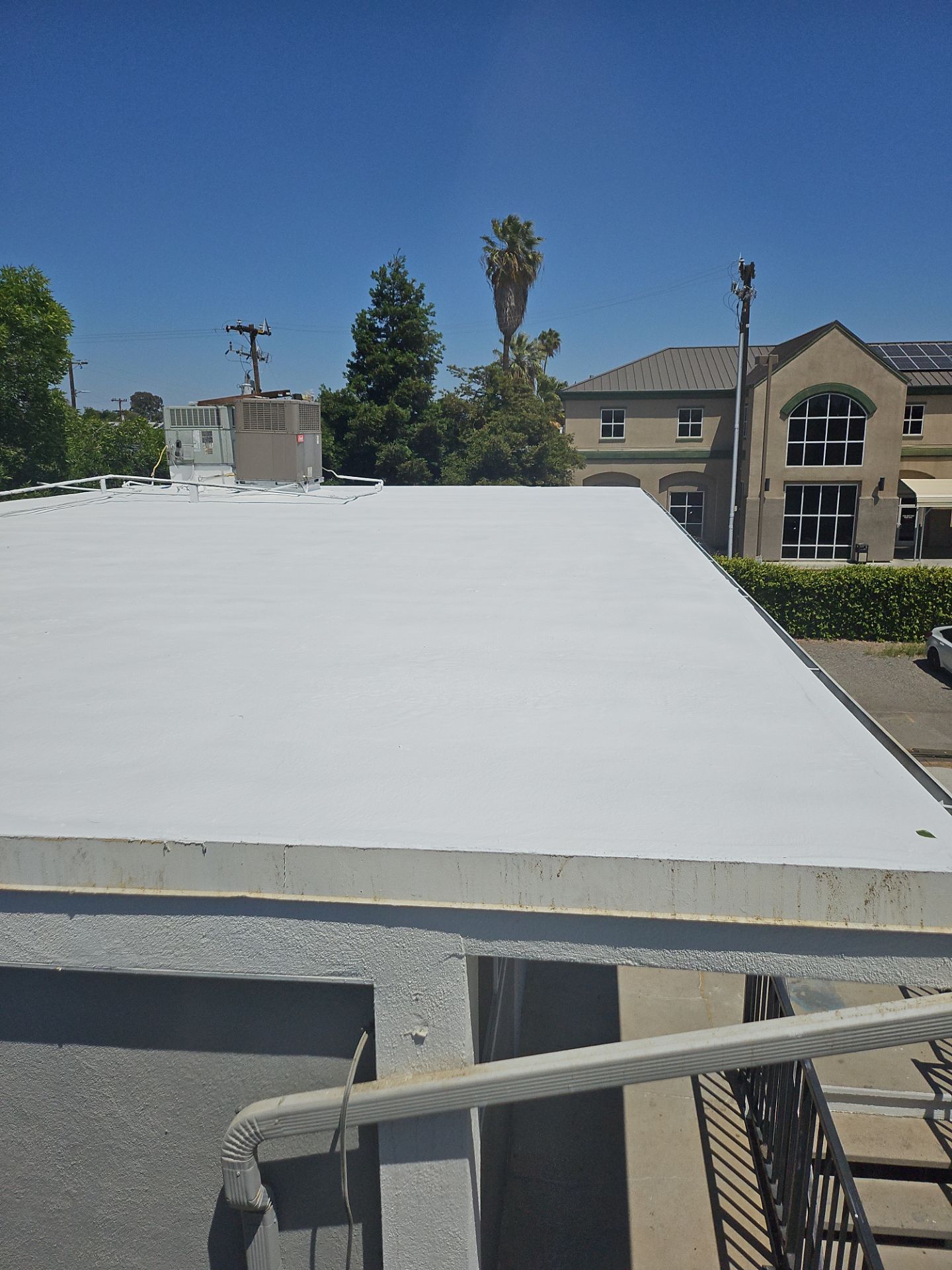 Foam Refurbish using General Coatings acrylic coatings and spray foam by Straight Edge Roofing Inc