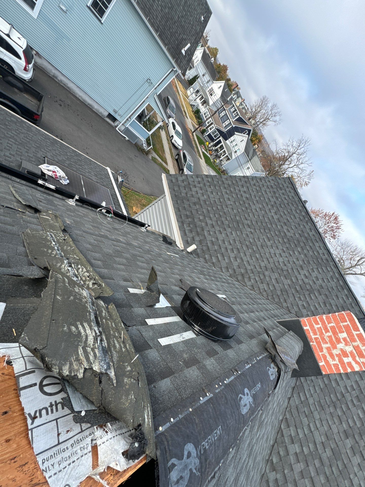 Estate Gray Shingles by Reimagine Roofing