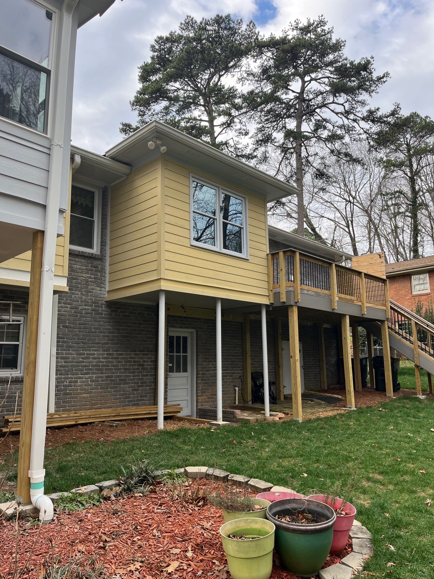 James Hardie Siding Replacement, Trex Railing Install, Exterior Painting, and Staining in Stone Mountain, GA by Nelson Exteriors 