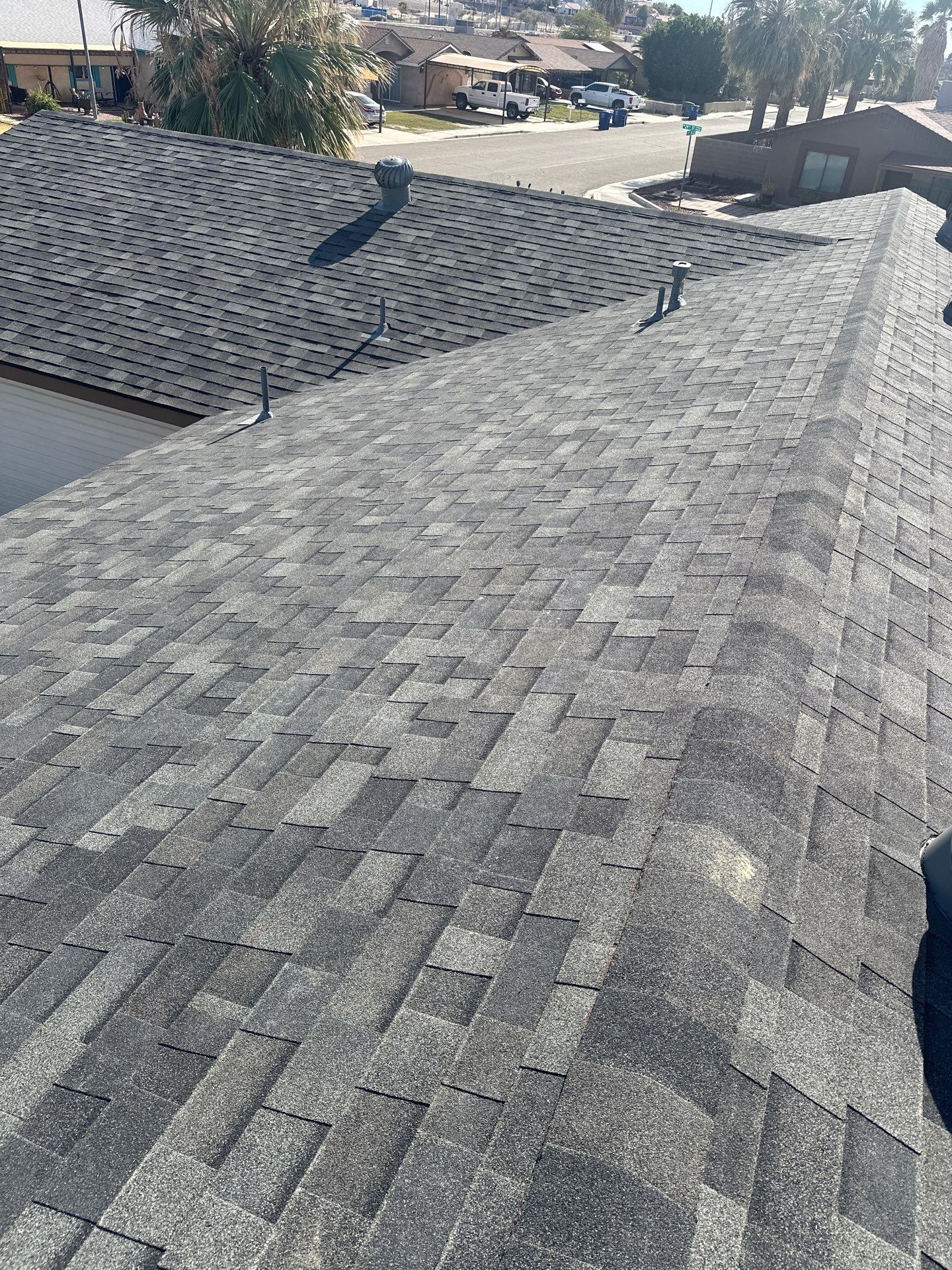 Estate Gray Shingles by Reimagine Roofing
