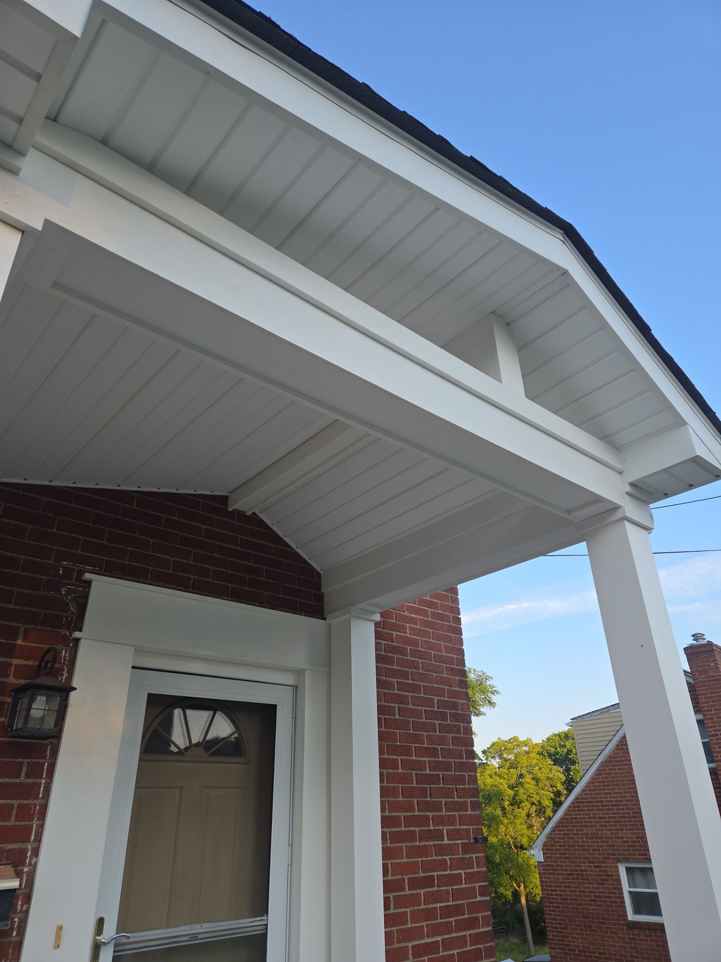 Concret and roof build  by Cousins Roofing Siding & Decks
