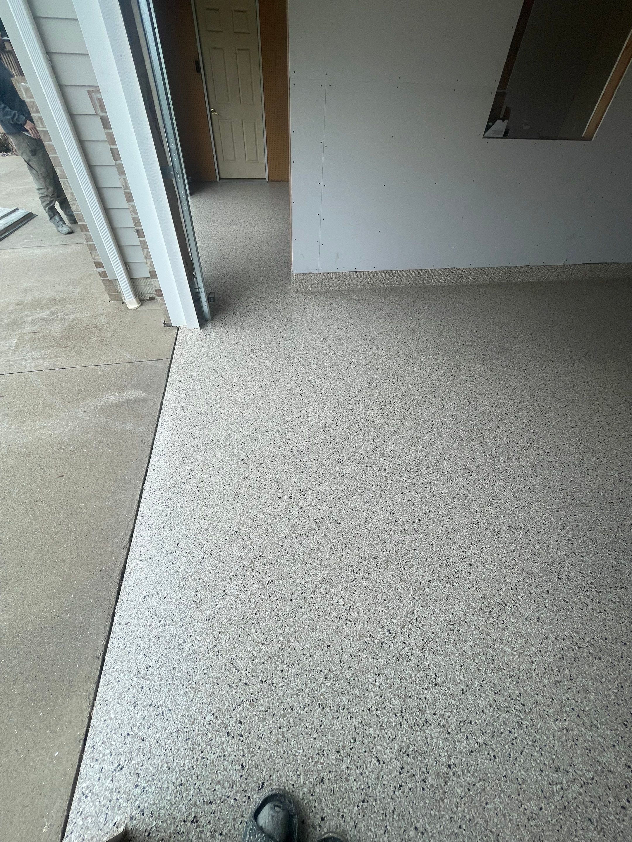 Speckled Epoxy Floor Coating Installation for Centerville Residential Garage by Select Painting, Coatings & Garage Cabinets