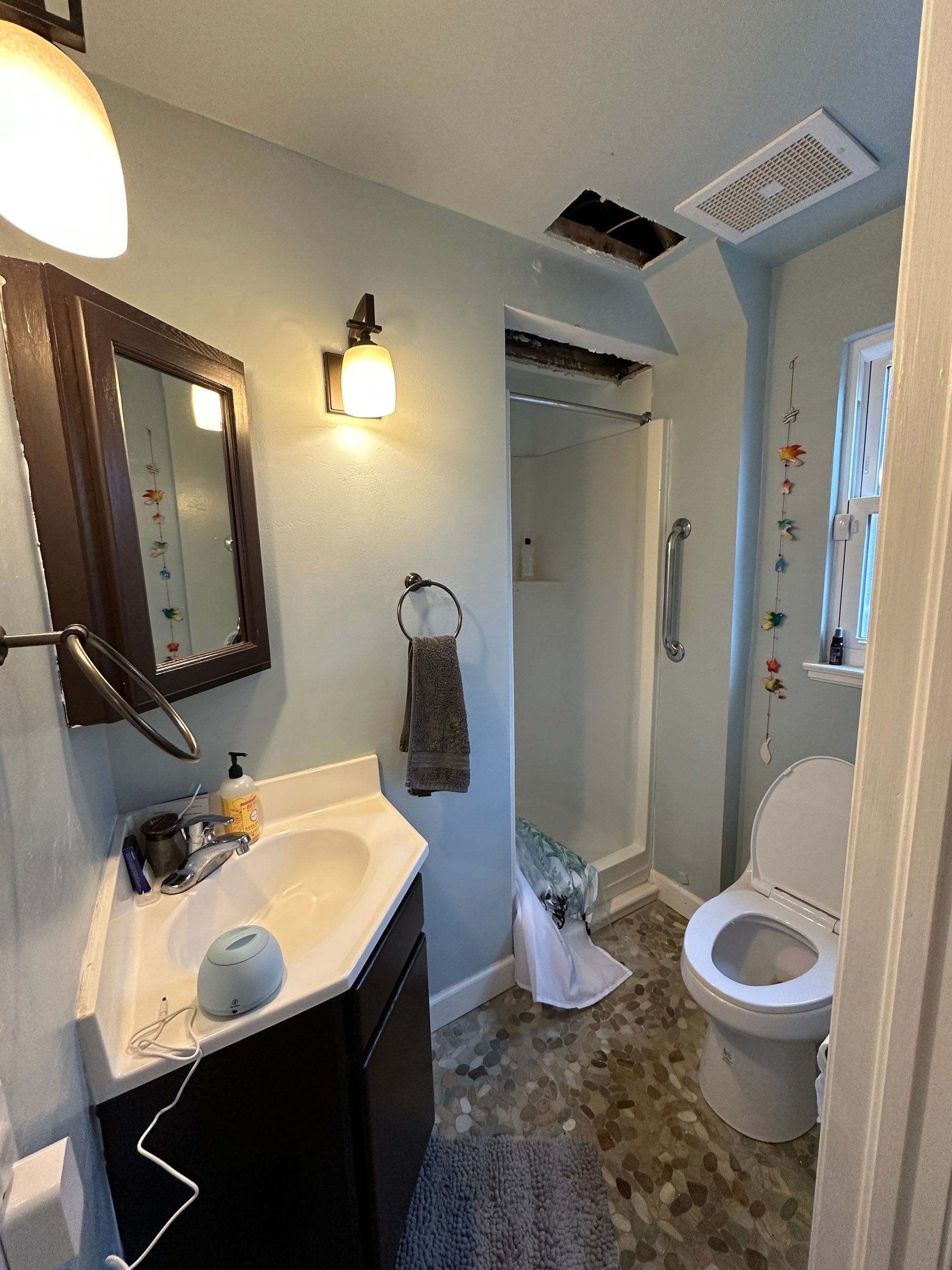 Bathroom-drywall repair and repaint by Herrera’s Bay Area Painting inc.