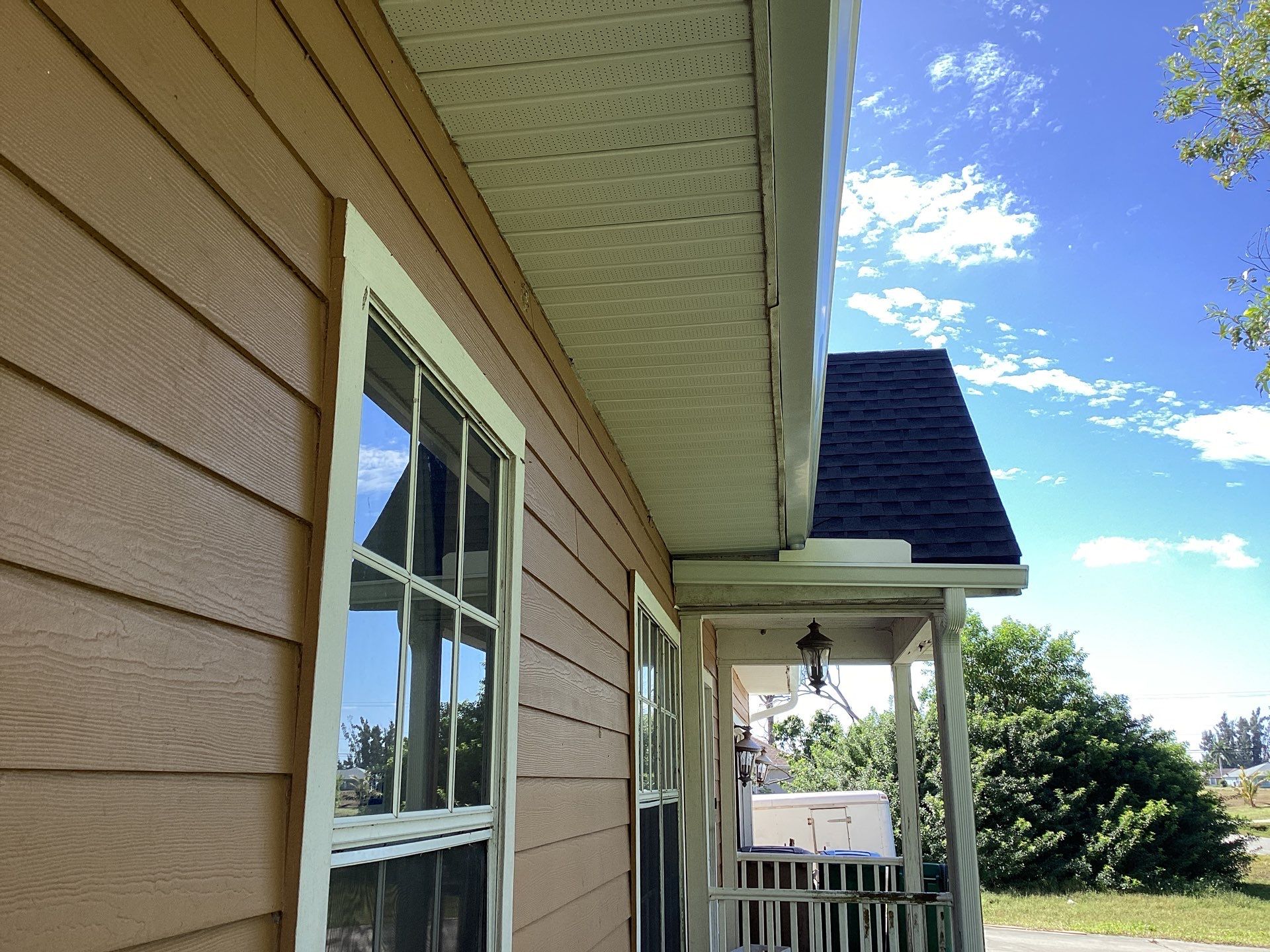 Soffit & Fascia White + New Downspouts by Gutter Professors