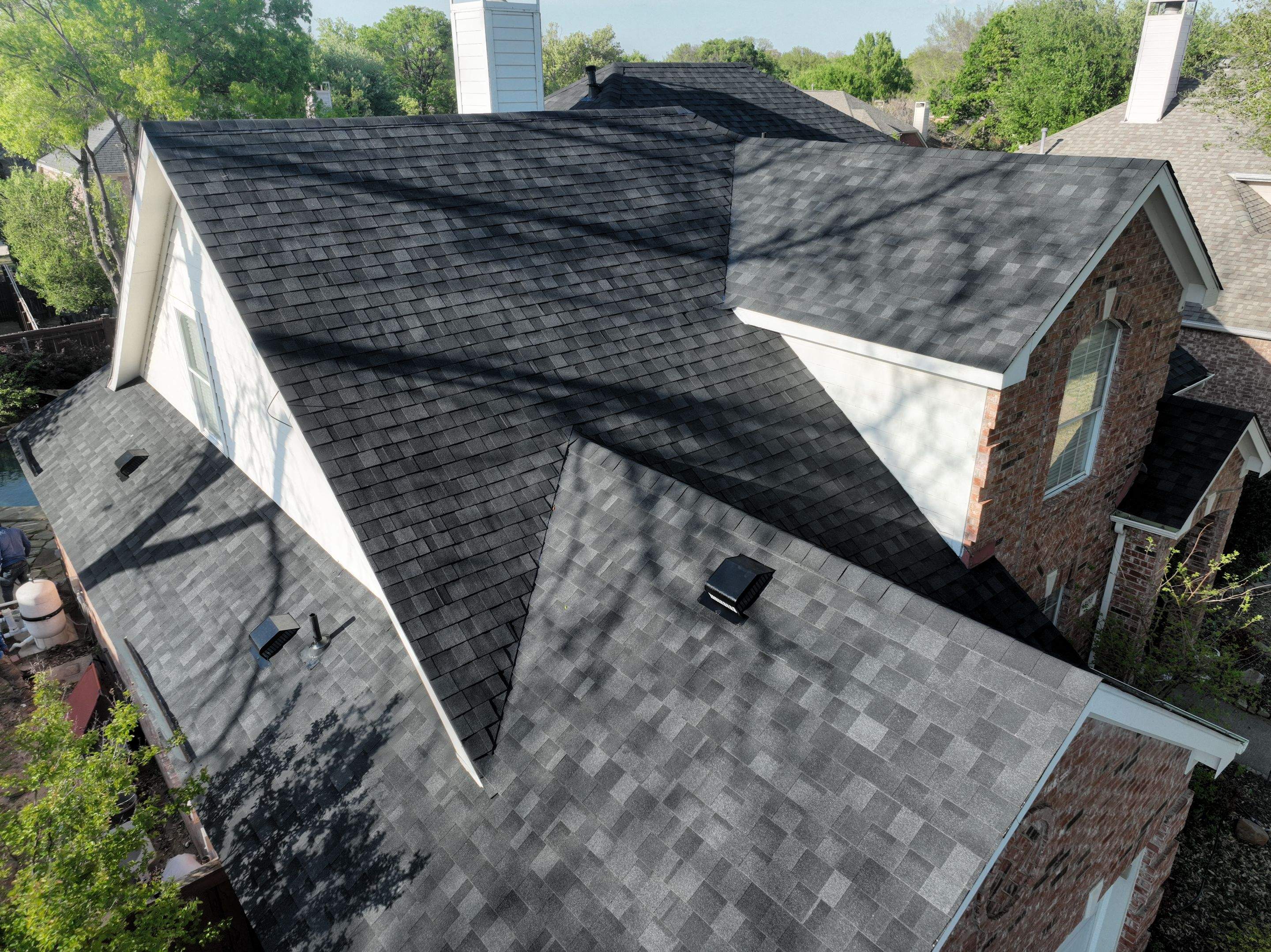 Residential Roofing Installation using IKO Nordic Granite Black by OneSource Roofing and Restoration
