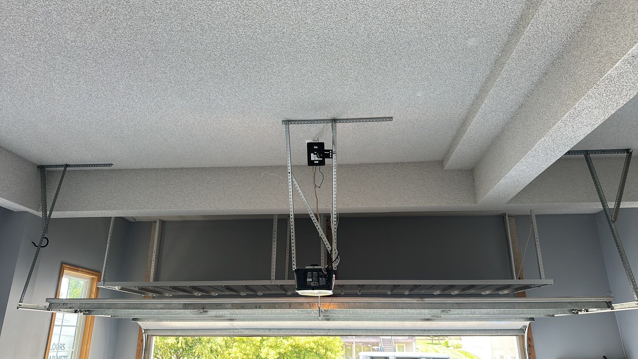 Matt N. took his garage to the next level with our Domino floor and cabinets  by Banner Garage