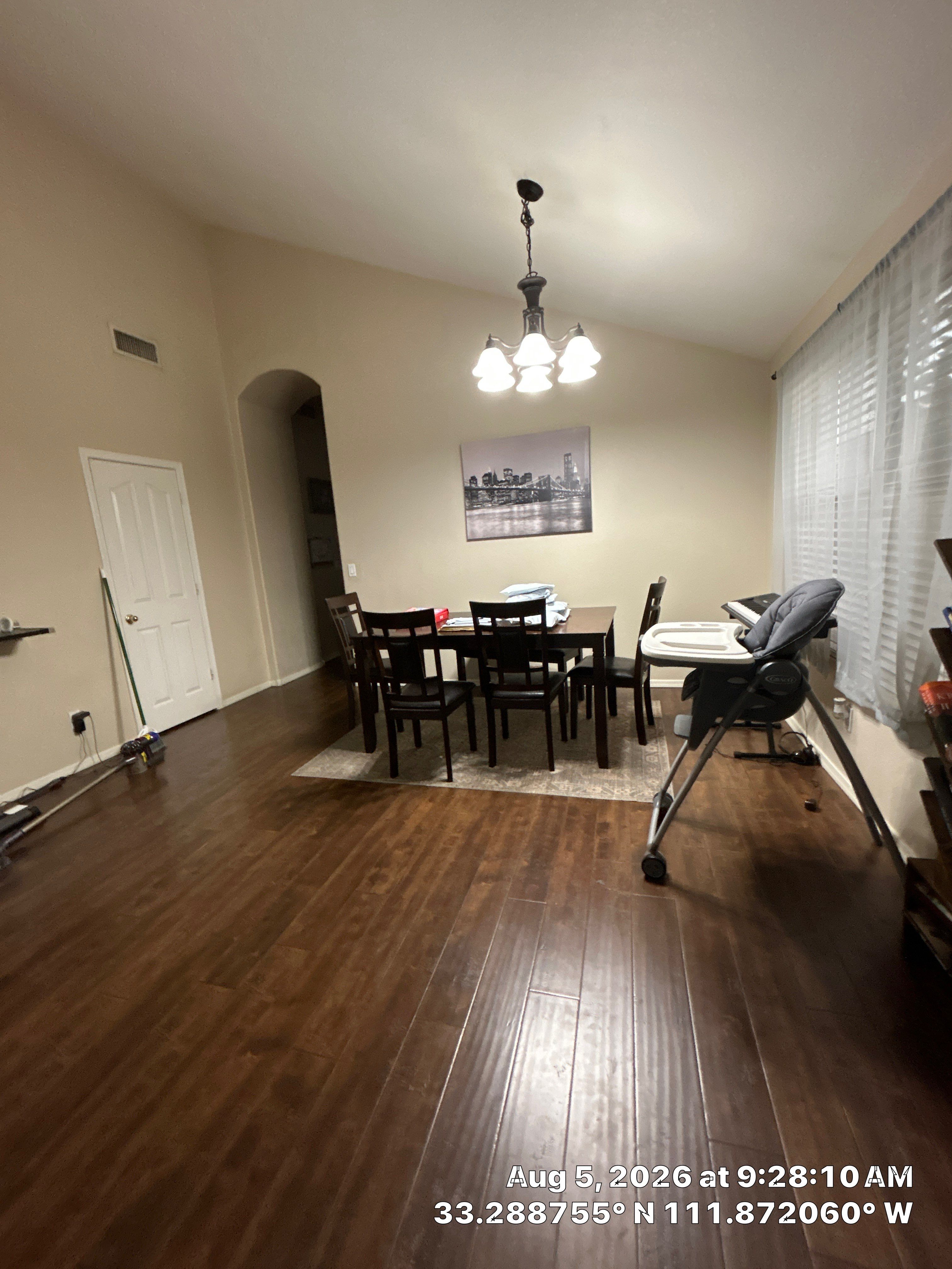 Modern Dining Room Renovation With Dark Wood Flooring in Chandler by CompanyCam Sales Demo