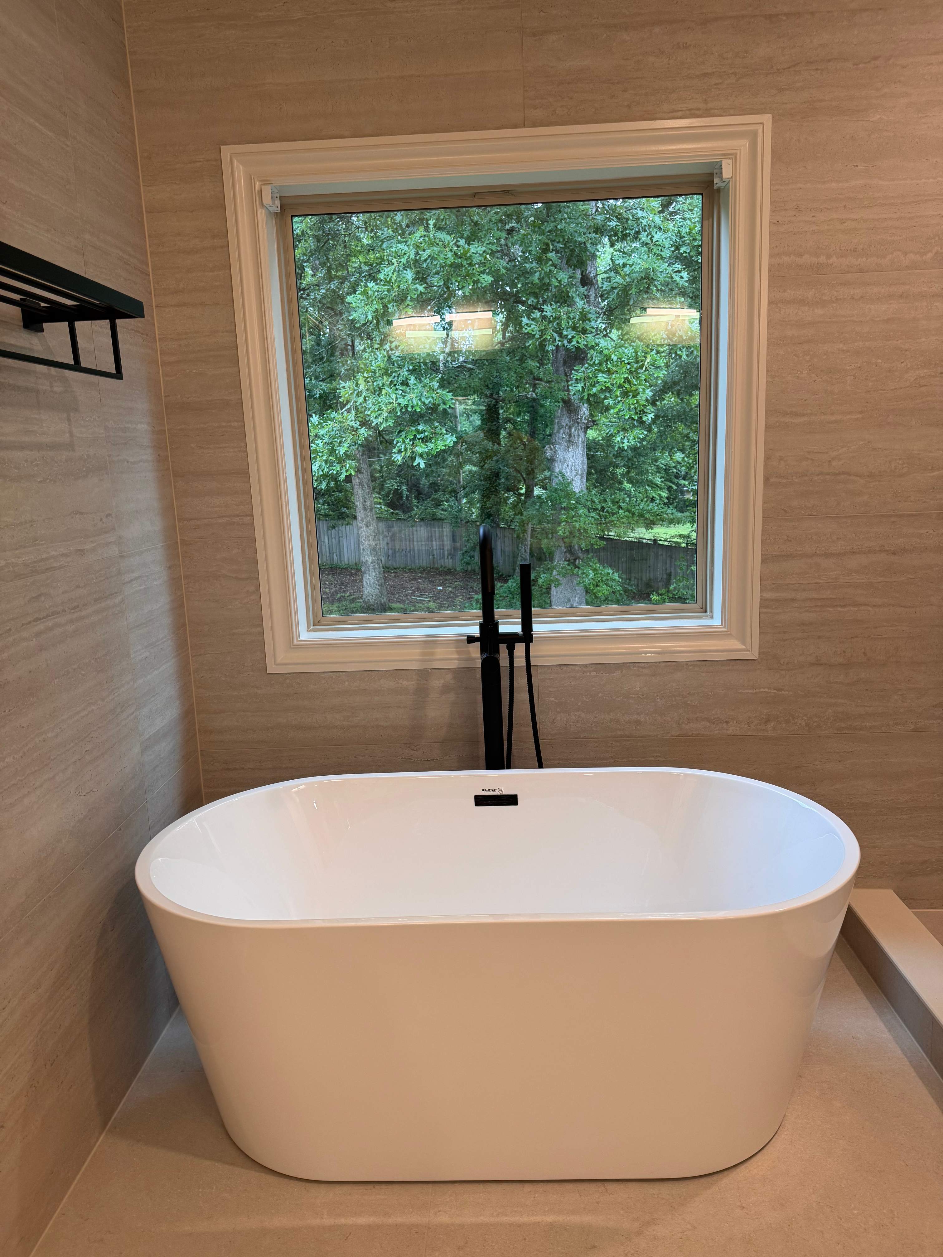 Master bathroom renovation using Free standing tub by Prudencio