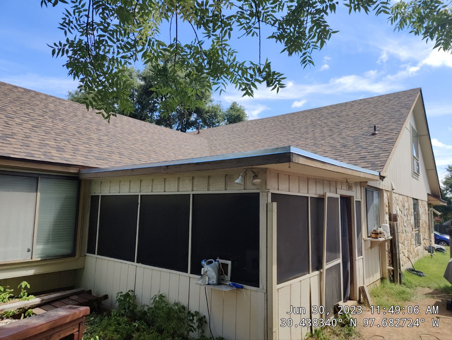 New Roof Installation Of IKO Dynasty Color Brownstone by DeZign Roofing & Exteriors