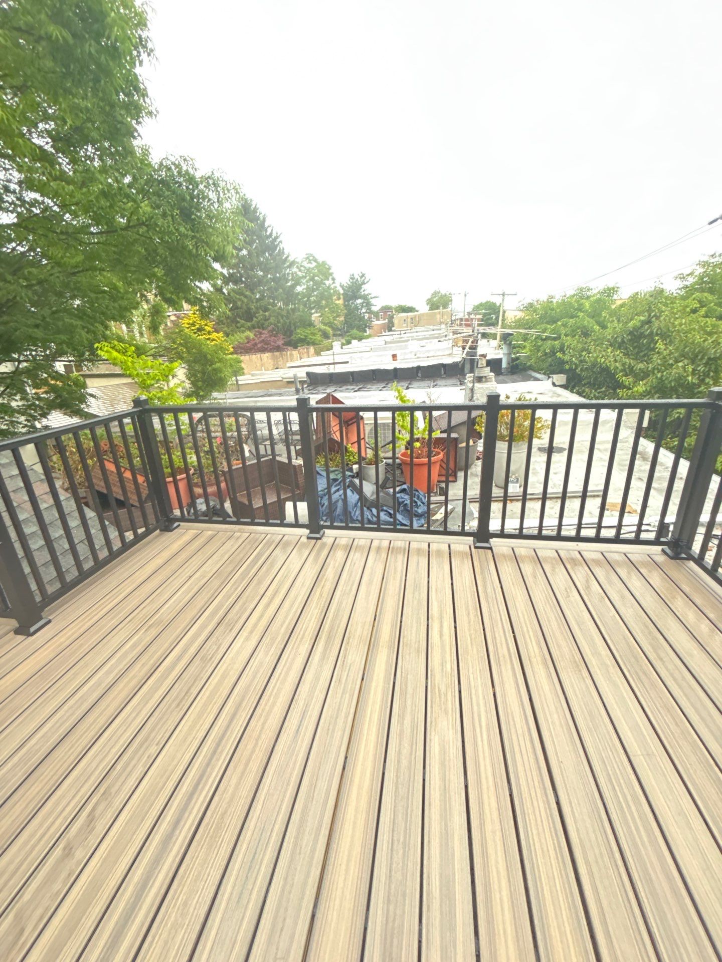 Roof Replacement and Custom Trex Roof Top Deck Project in Philadelphia, Pennsylvania by Philadelphia Quality Roofing