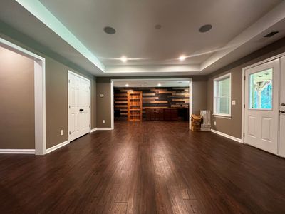 Custom Basement Remodeling With Home Theater and Bar in Woodstock