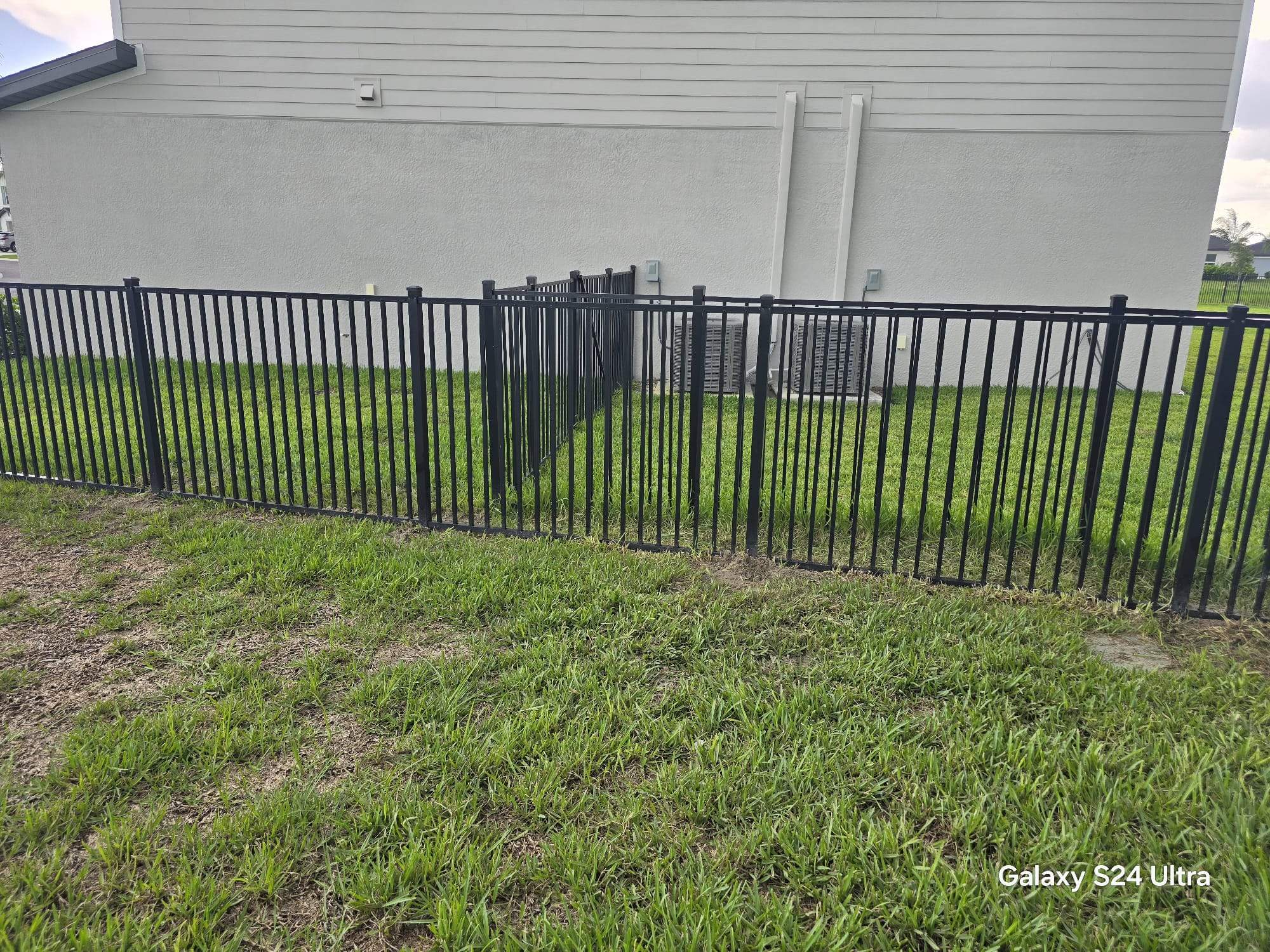 Black Aluminum Picket Fence Installation in North Fort Myers by True Fence LLC