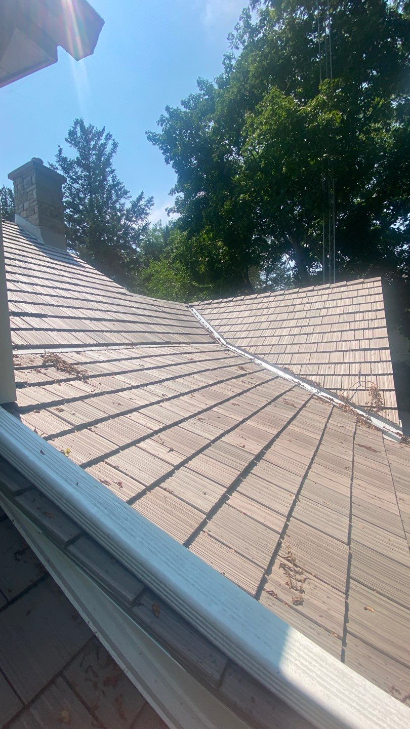 DaVinci Roof Installation with Snow Guards in Oconomowoc Lake by Custom Installations
