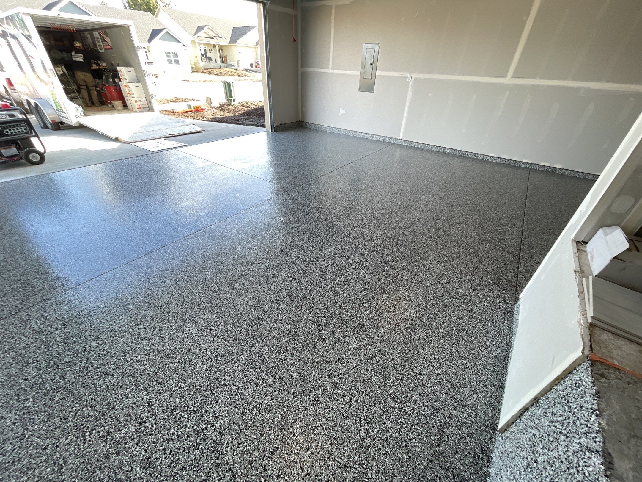Garage Transformation using Domino by Croc Coatings, LLC