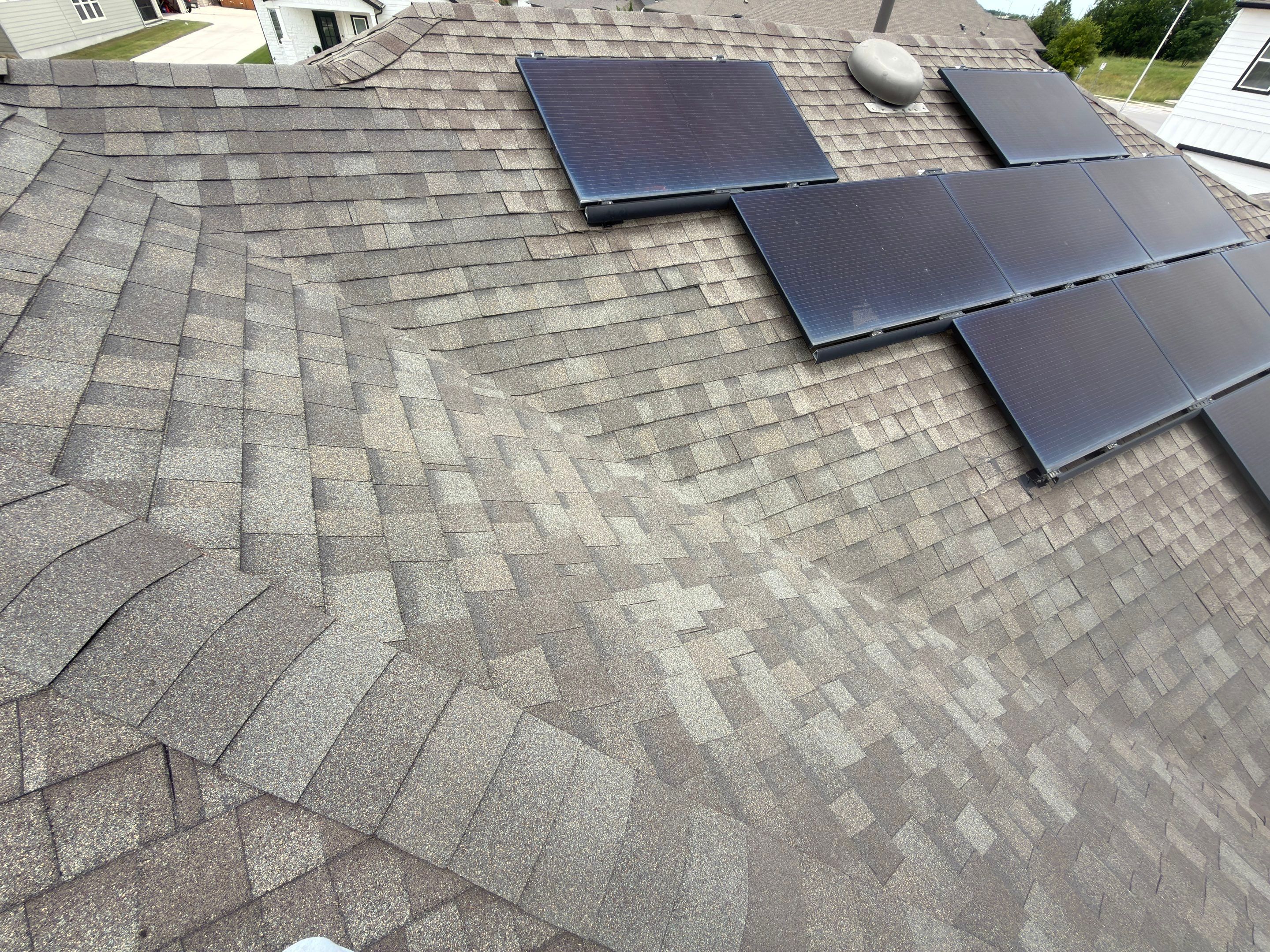 Roof Replacement with Solar Re-Install in Southeast Austin by Skywall Construction LLC