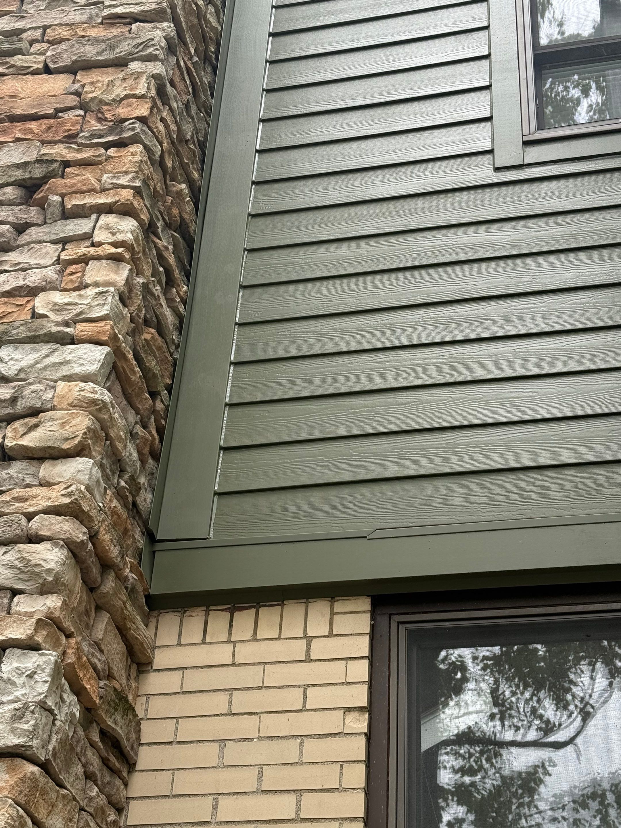 Hardie siding  by Cousins Roofing Siding & Decks