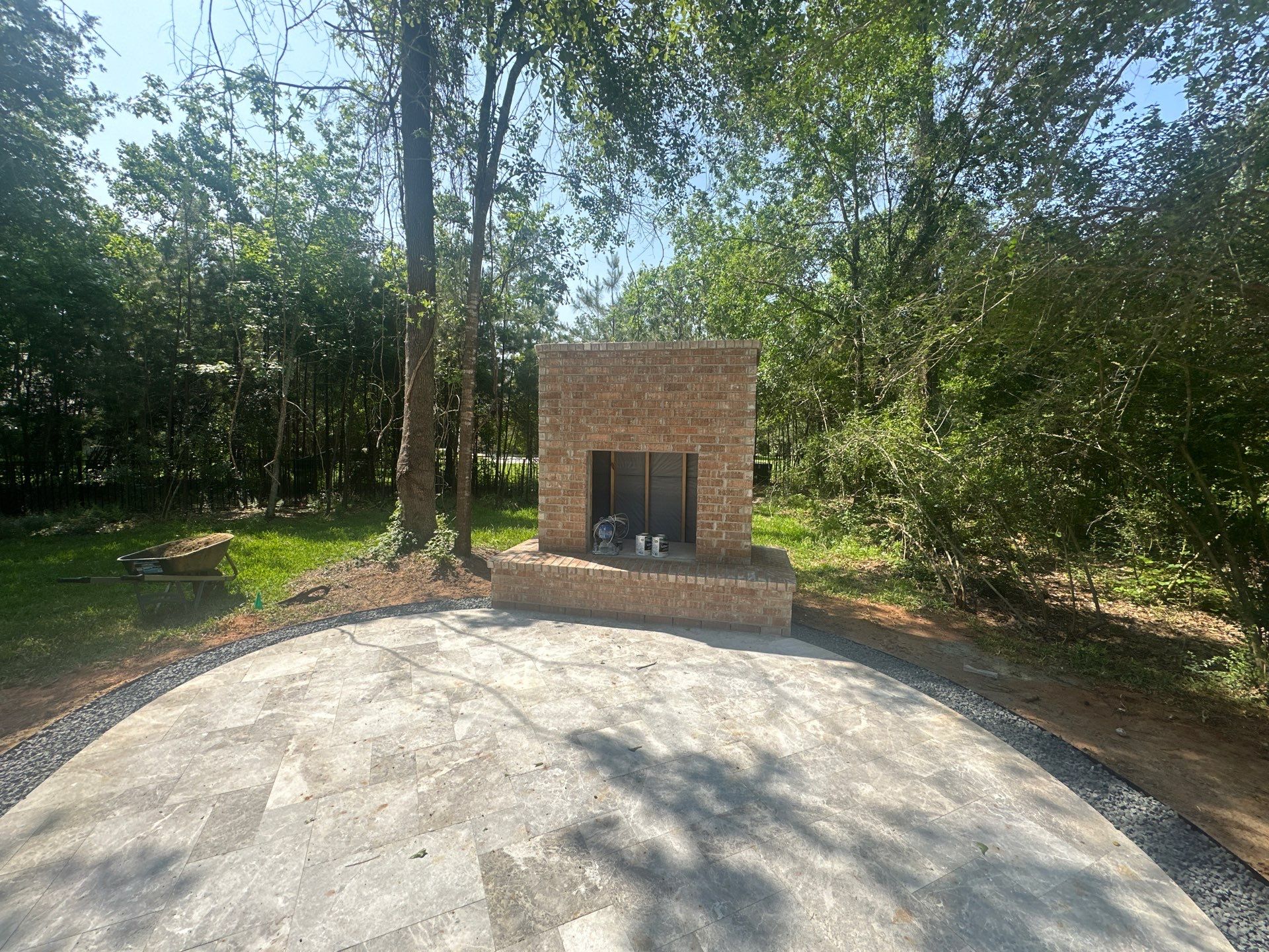 Outdoor Fireplace in Tomball, TX by SophAlx LLC
