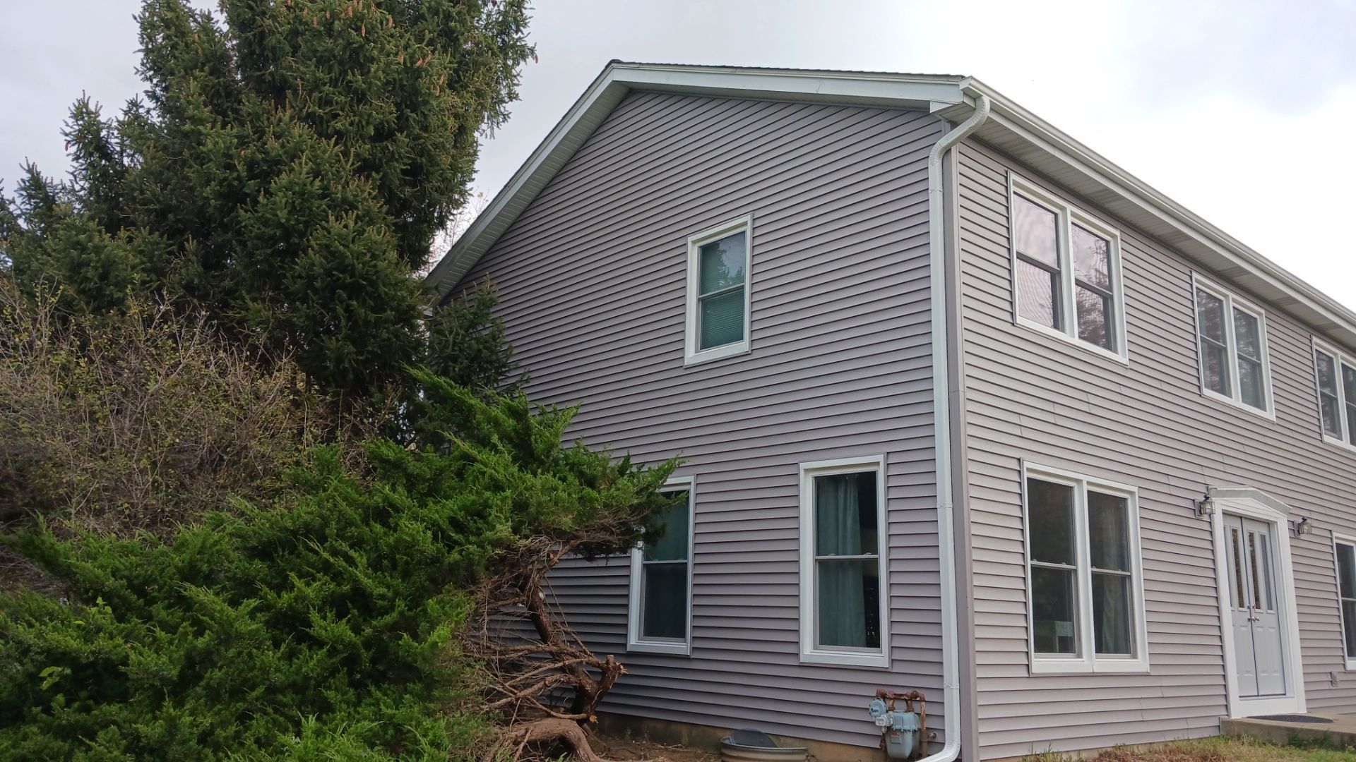 New Siding and Windows by NextWave Construction