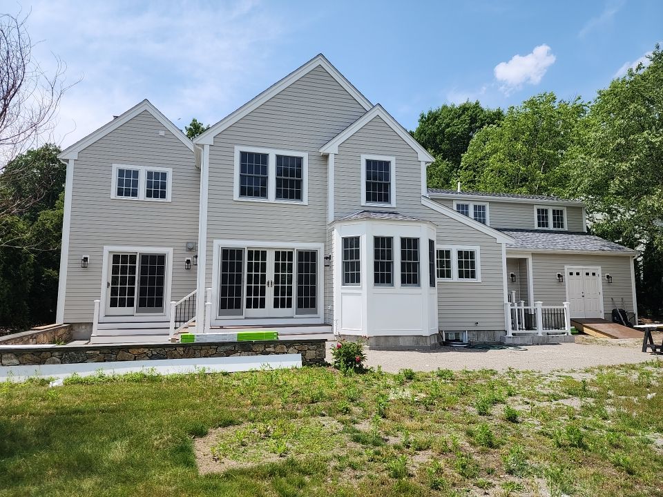 Siding on new construction in Brookline, MA by UBrothers Construction
