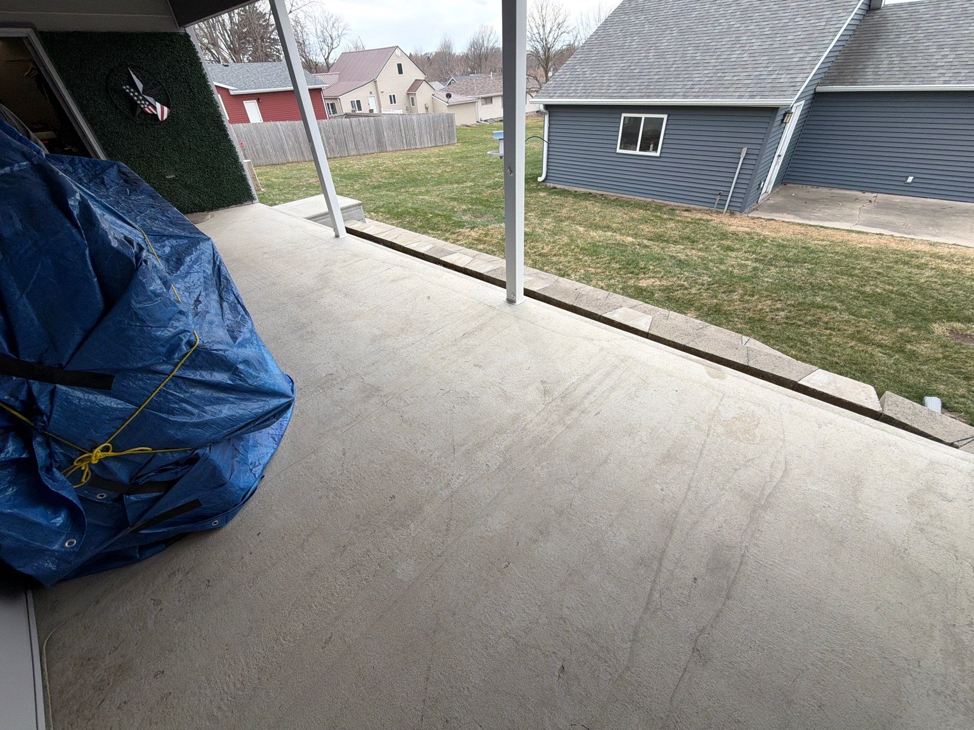 Custom Grey Flake Epoxy Garage Floor Installation in Remsen by Select Painting, Coatings & Garage Cabinets