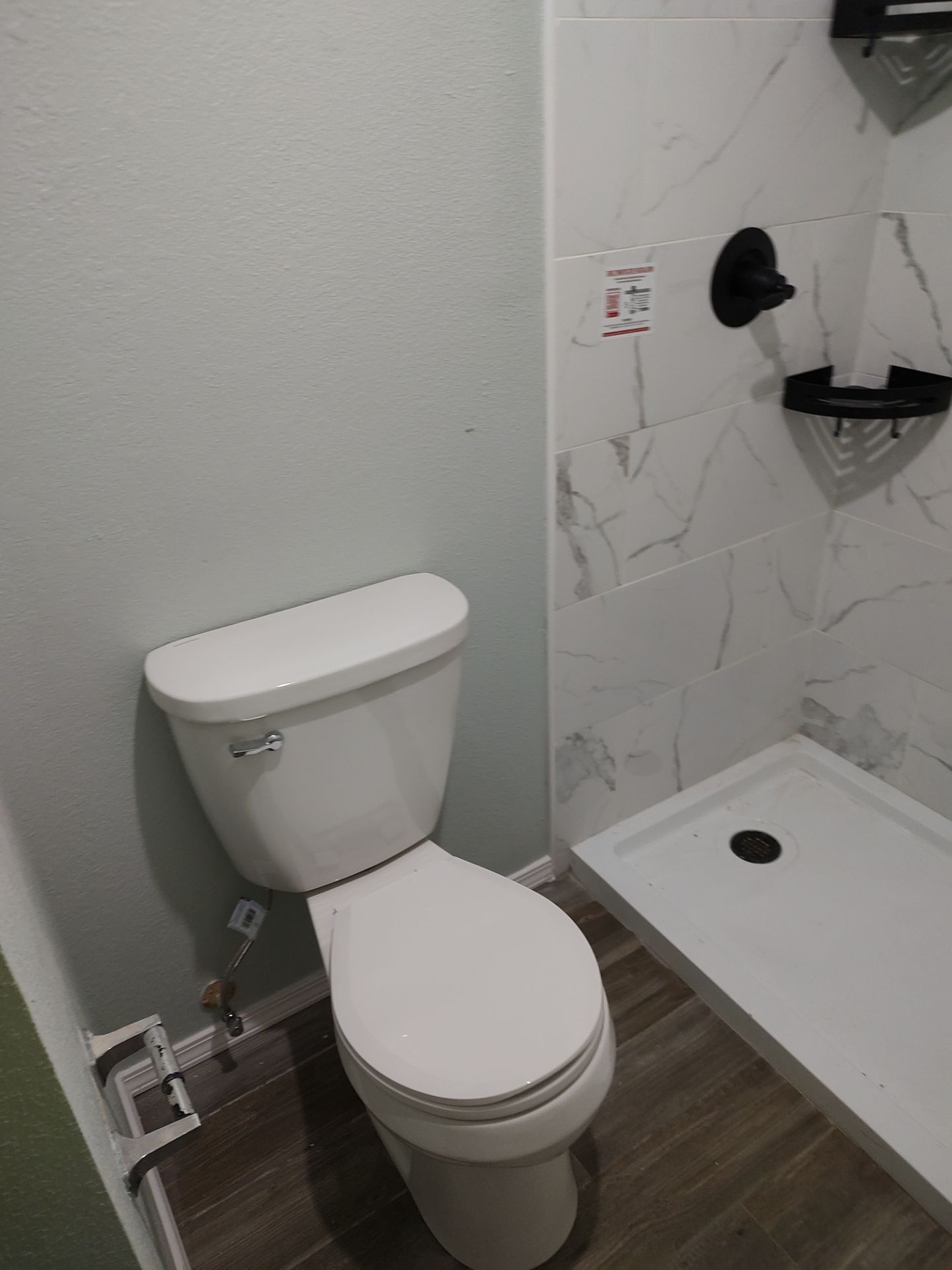 Bathroom remodel w/shower upgrade by In & Out Construction & Remodeling, LLC