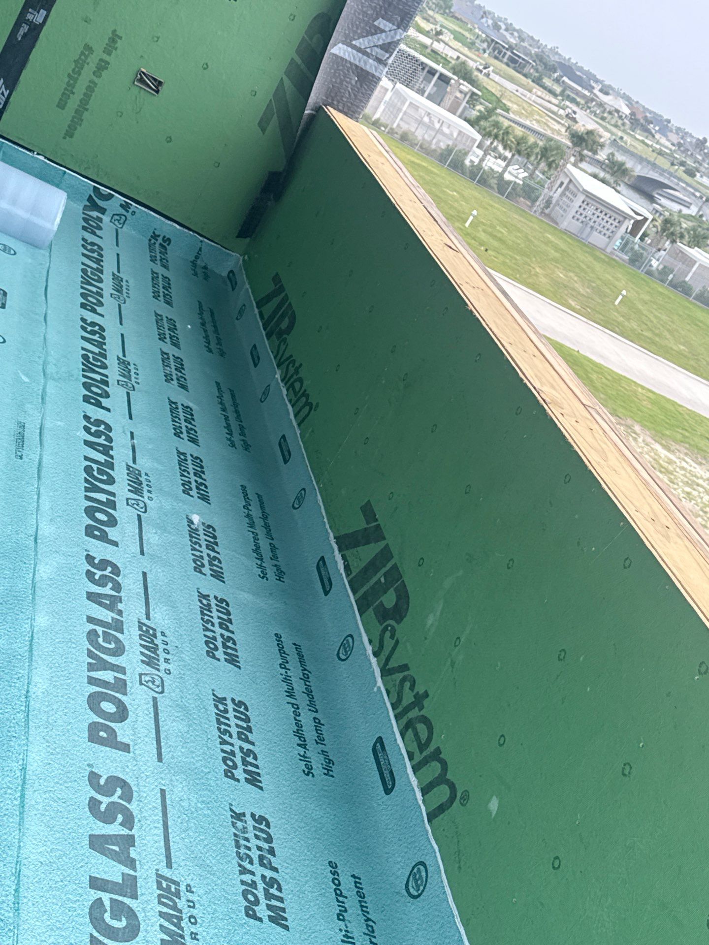 Walk Out, Island Style by Bayfront Roofing and Construction