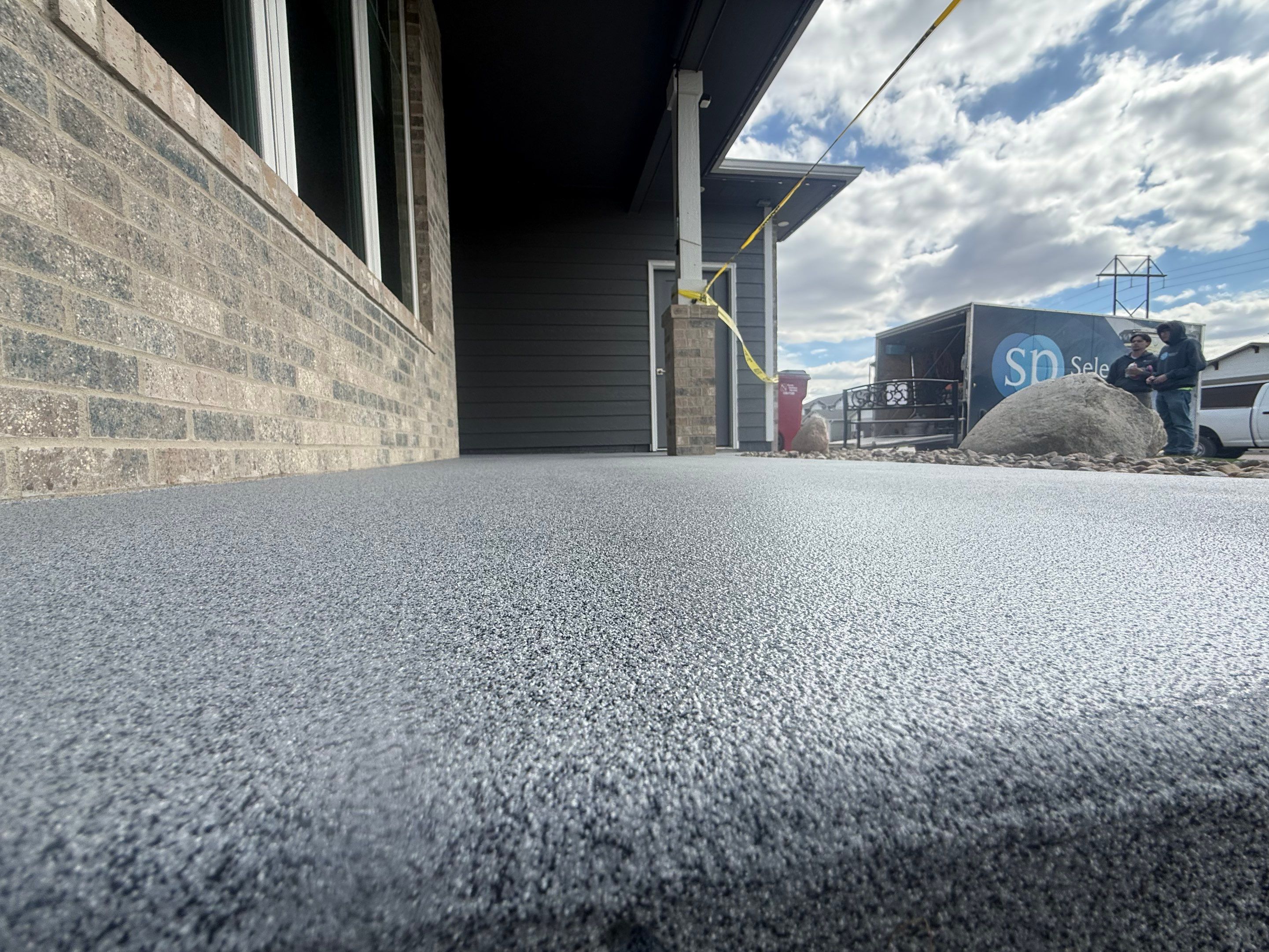 Decorative Flake Concrete Coating for Sioux Falls Porch and Patio by Select Painting, Coatings & Garage Cabinets